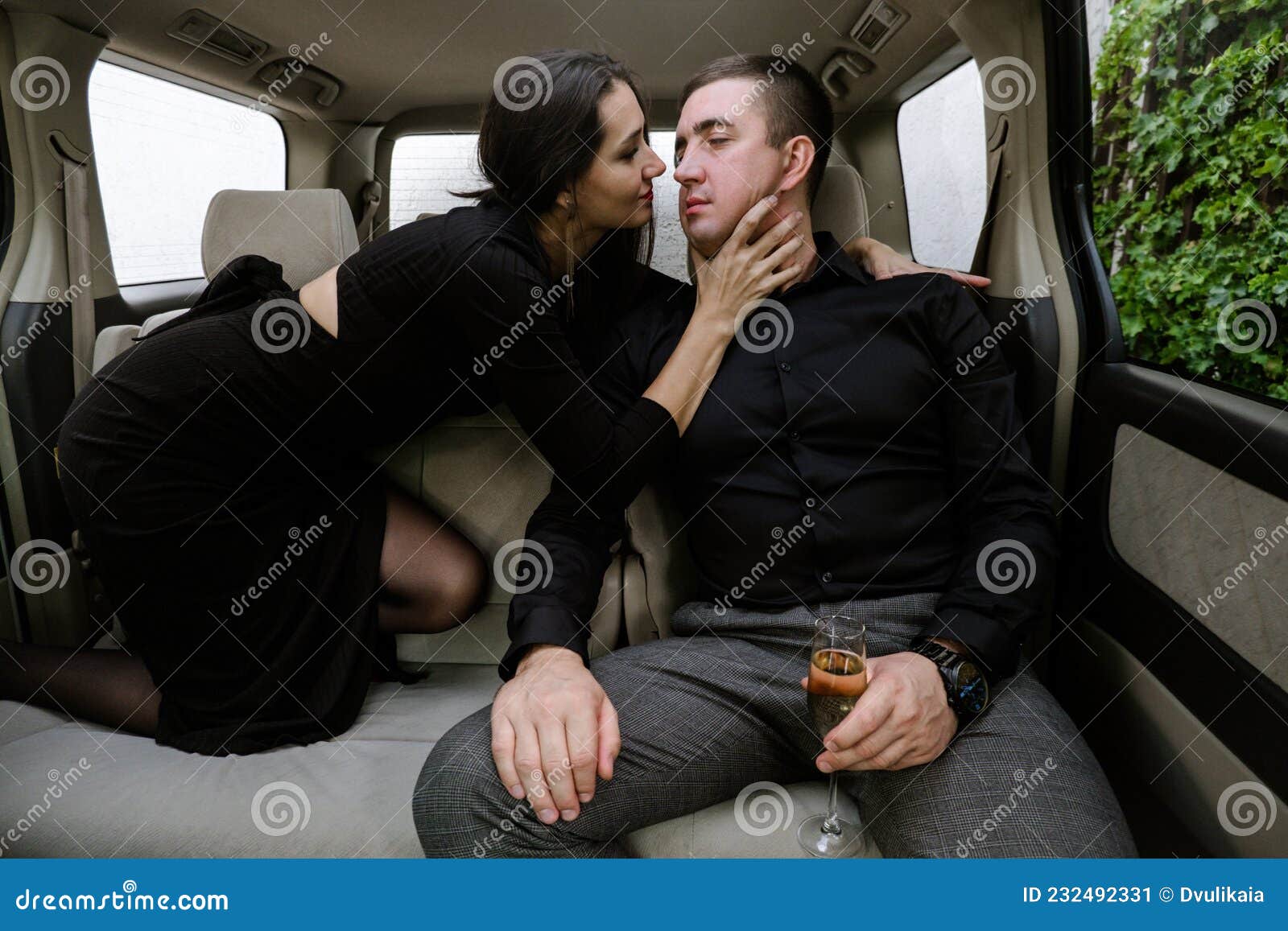 Young Woman Kissing Handsome Young Man in pic