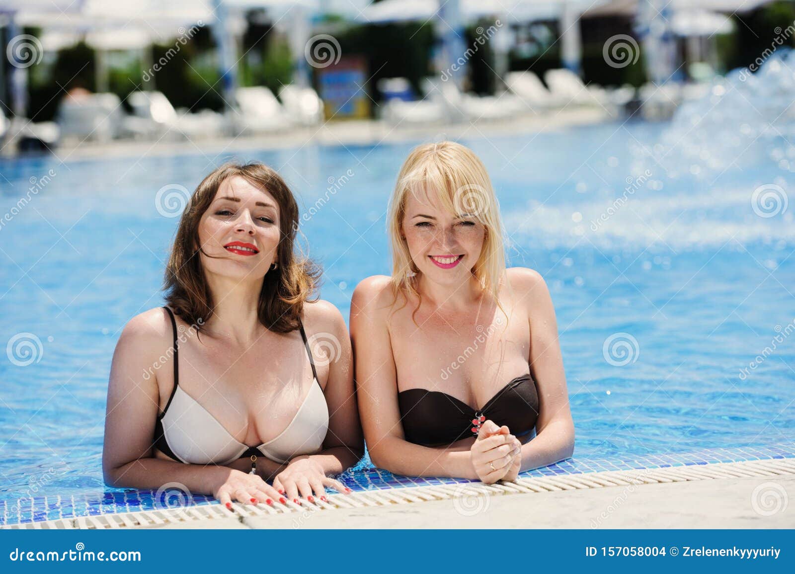 Young Women in the Swimming Pool Stock Photo - Image of relax