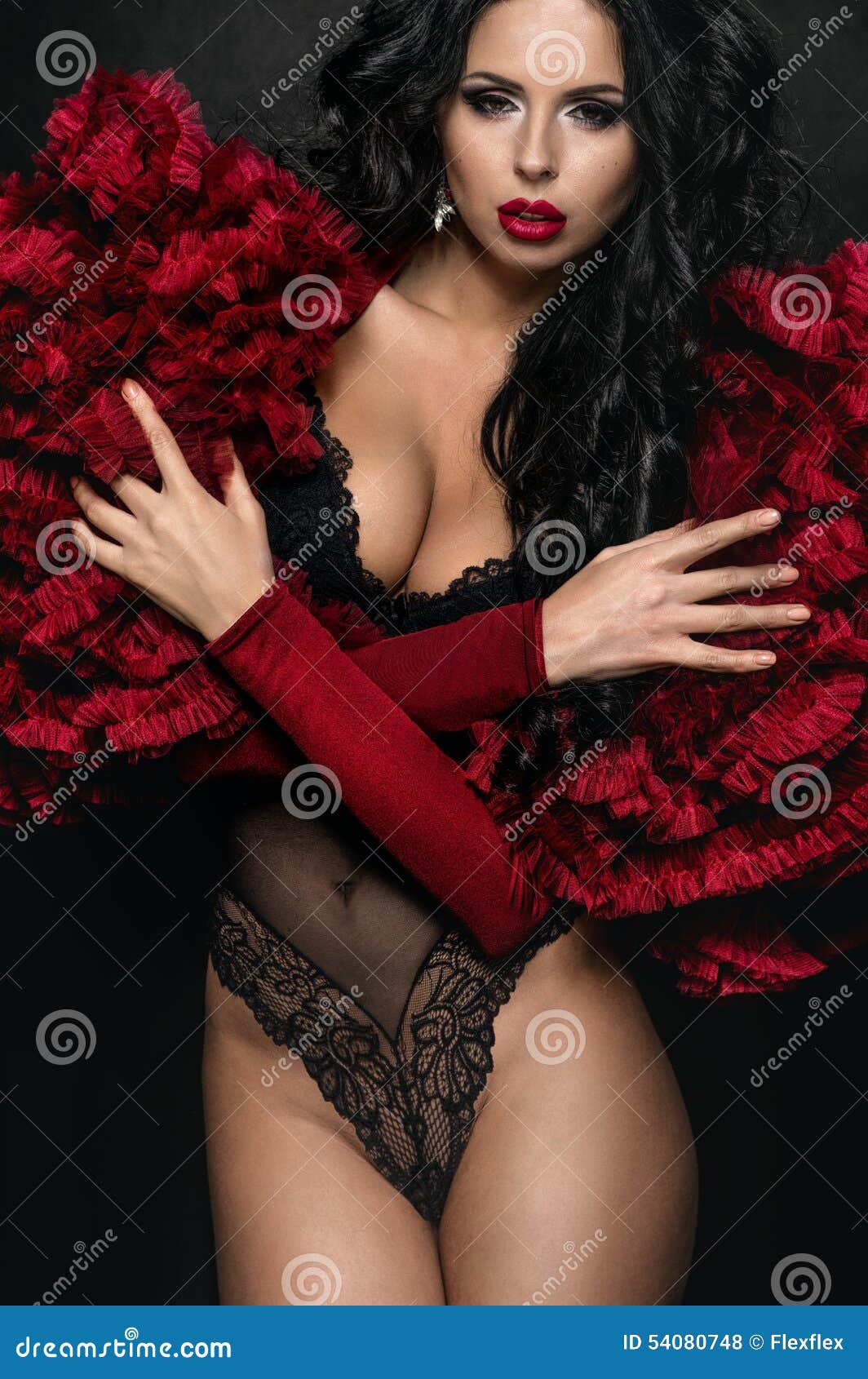 Sexyvwoman in Black Underclothes and Red Fluffy Bolero Stock Photo photo photo