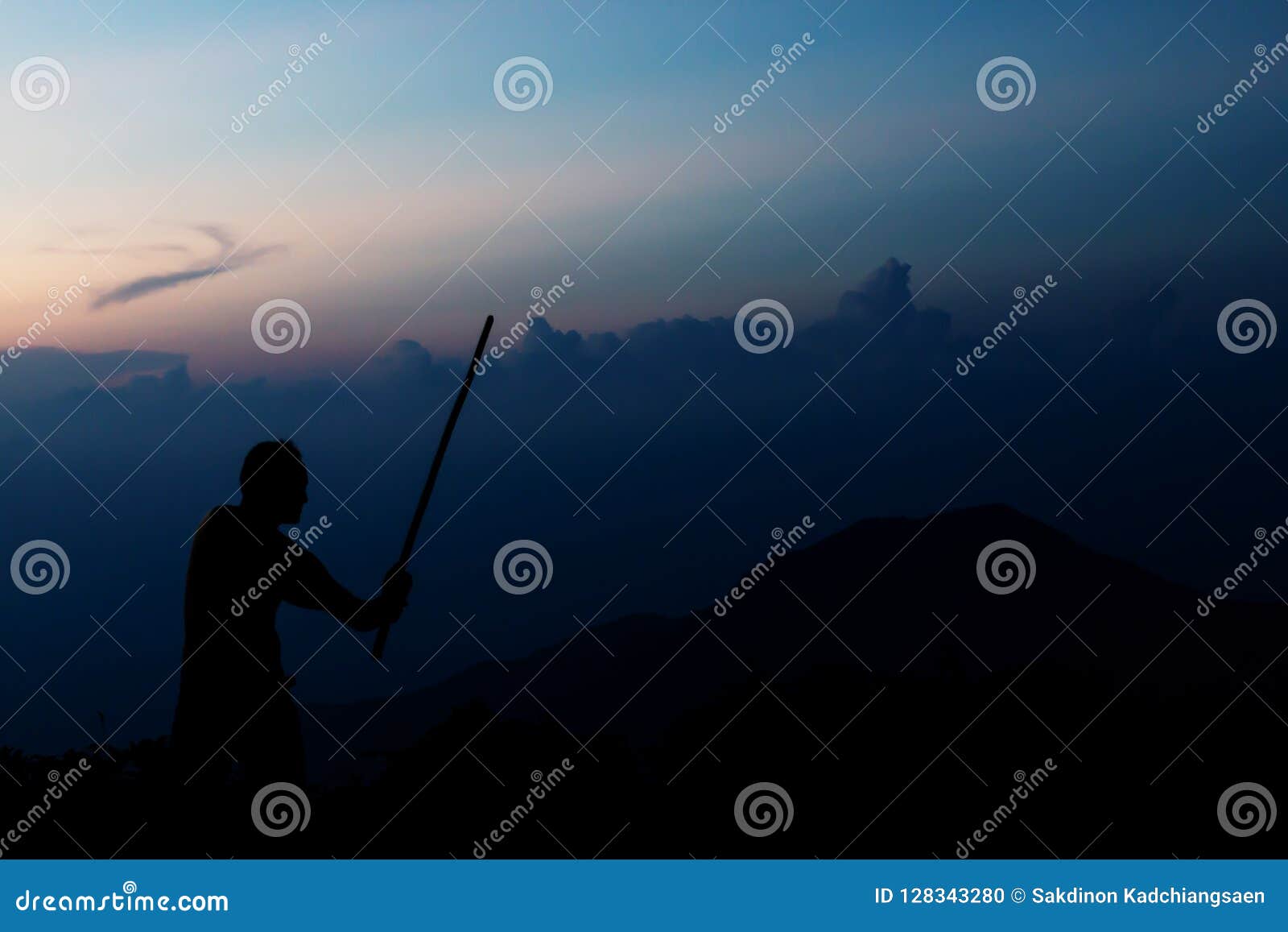 Shadow of Samurai with Sword Practice Fencing and Beautiful Mountain