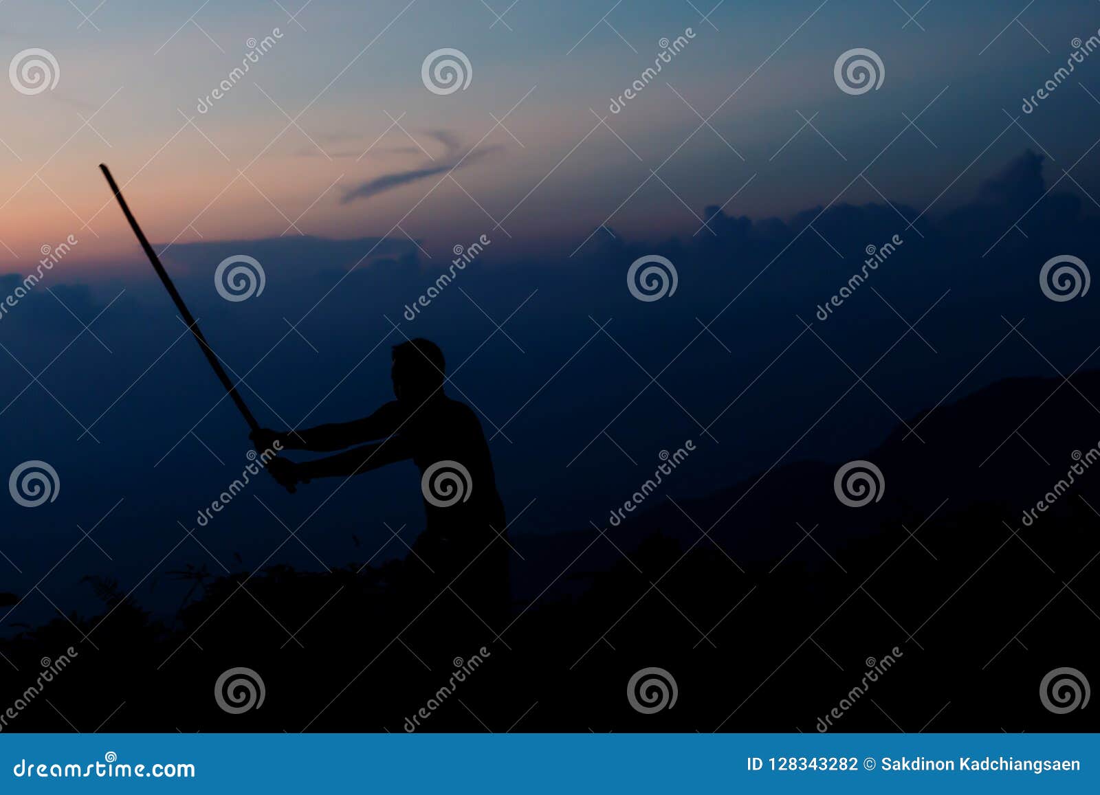 Shadow of Samurai with Sword Practice Fencing and Beautiful Mountain