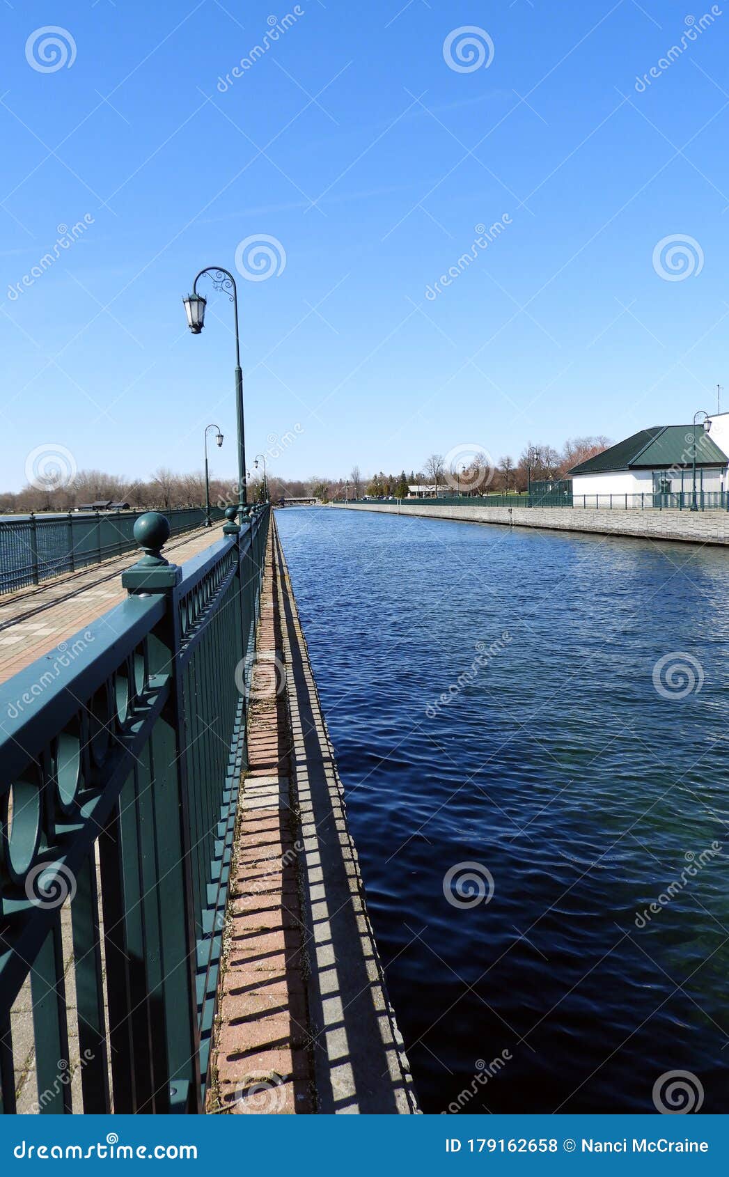 Shadows Along the Owasco Lake Canal Pier Walkway Stock Photo Image of