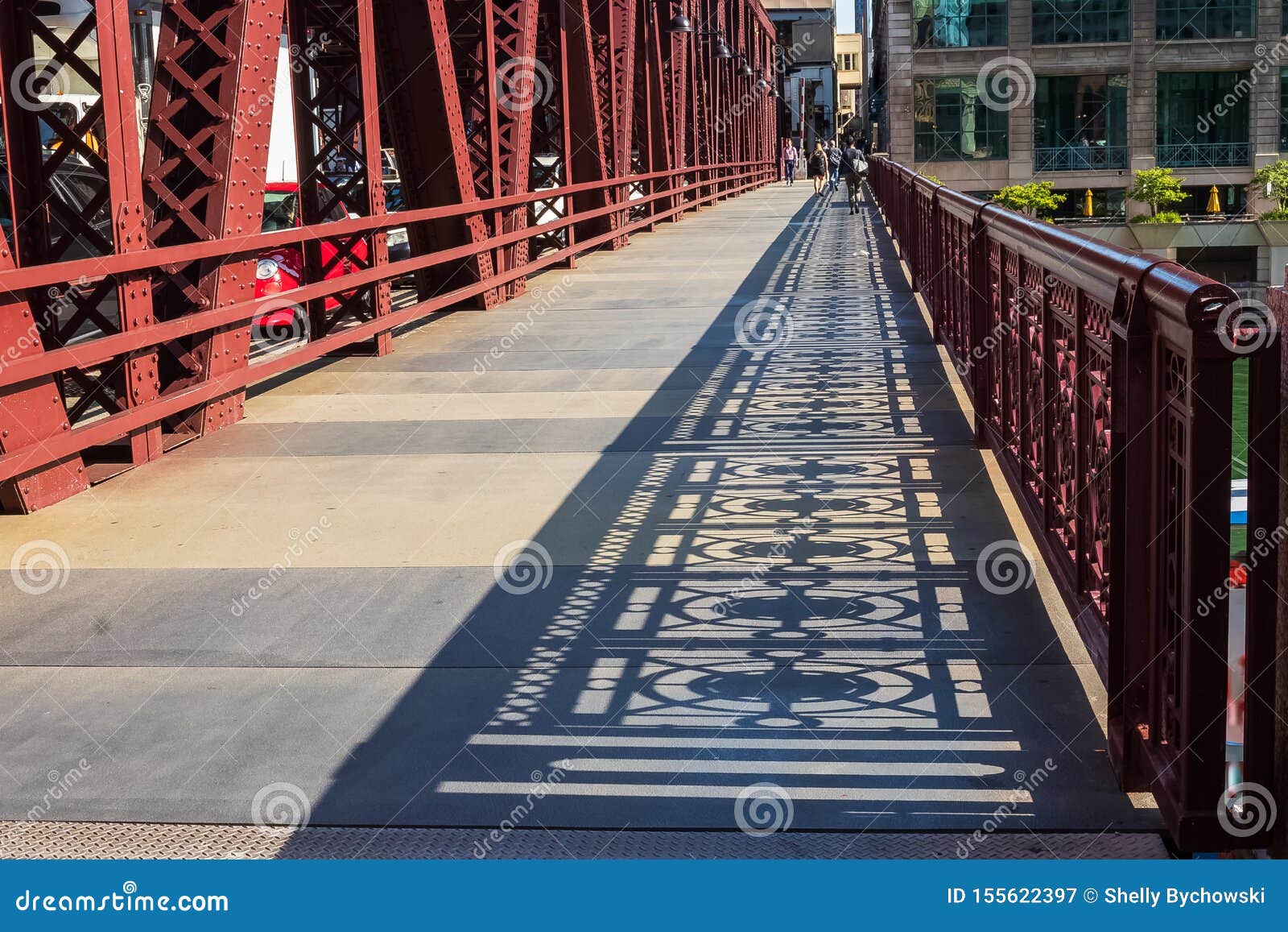 shadows of the bridge railing  on wells street drawbridge in downtown chicago loop