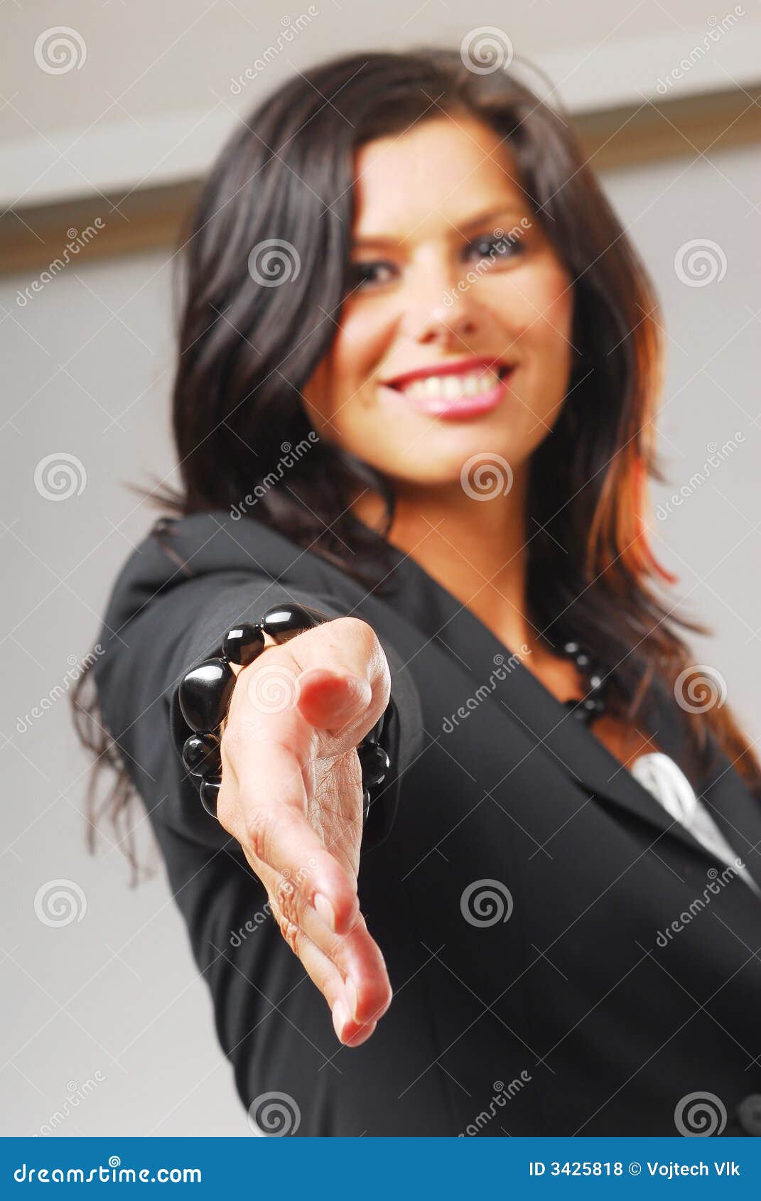 A shaking hands stock photo. Image of smile, woman, suit 3425818