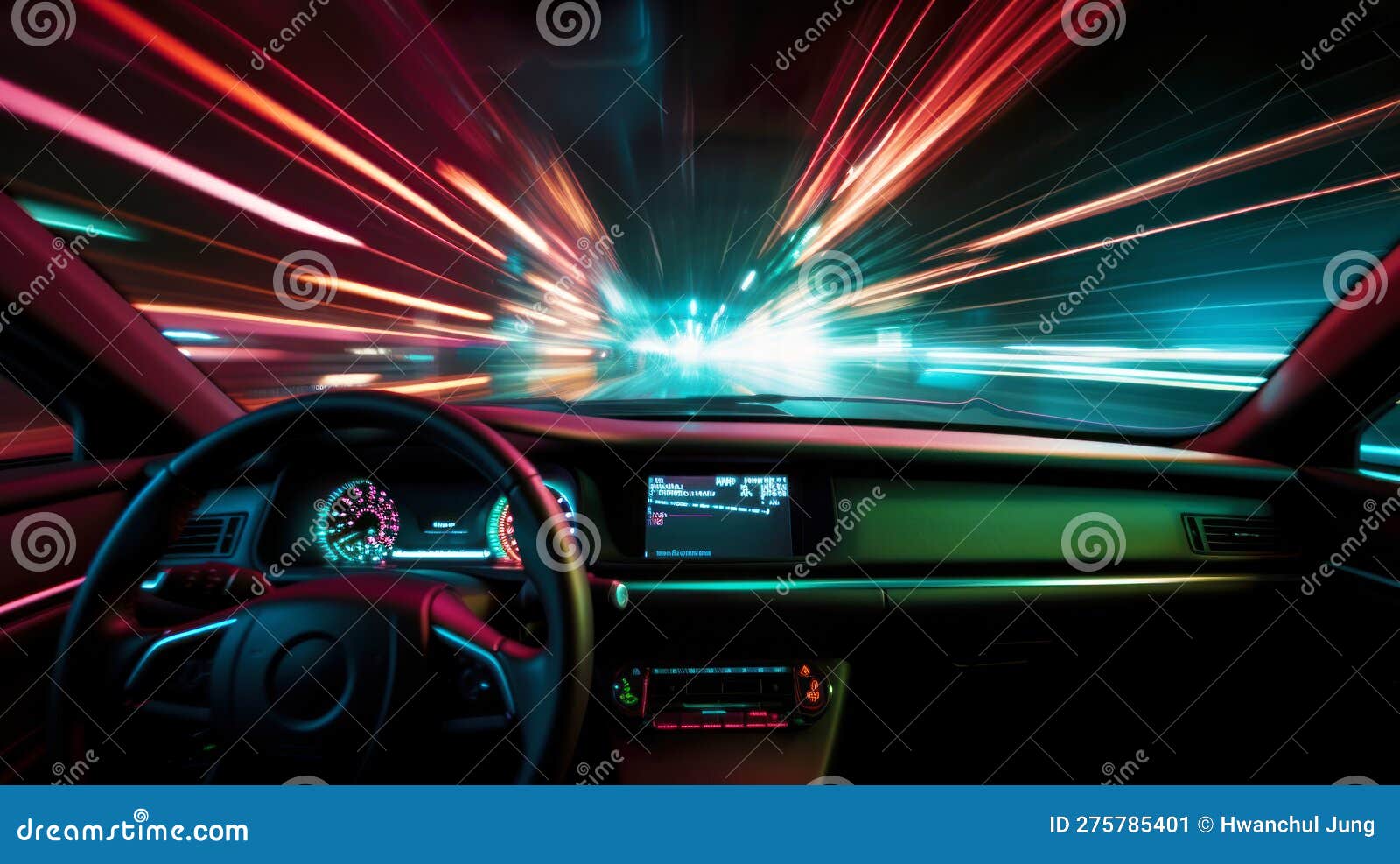 Long Exposure Image of Car Dashboard and Light Trails on the Outside of