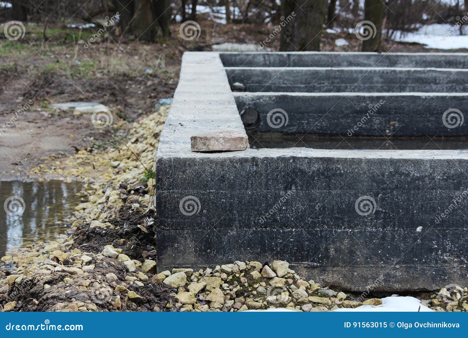 Shallow Concrete Foundation Stone for the Construction of the House