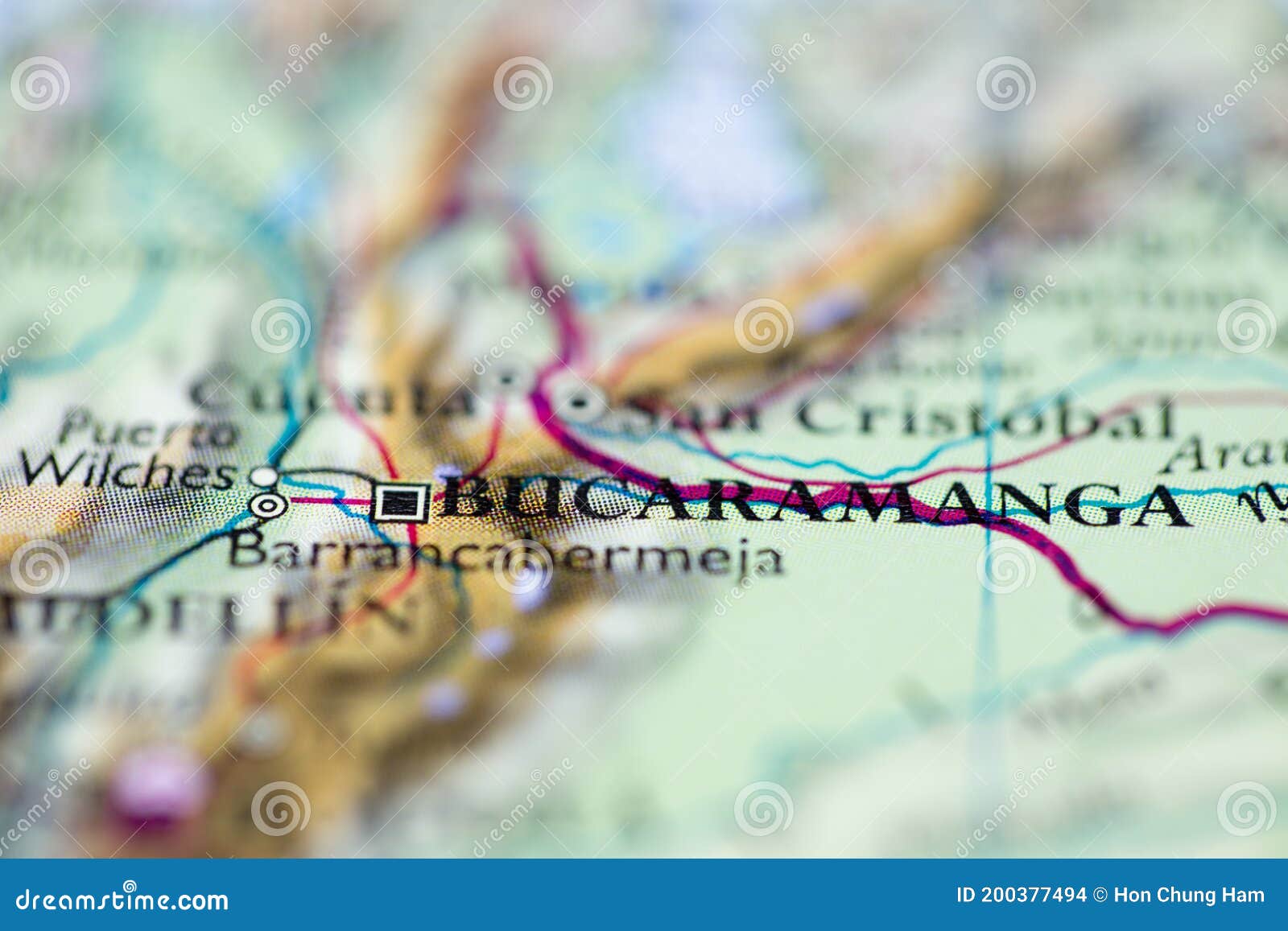 shallow depth of field focus on geographical map location of bucaramanga city colombia south america continent on atlas