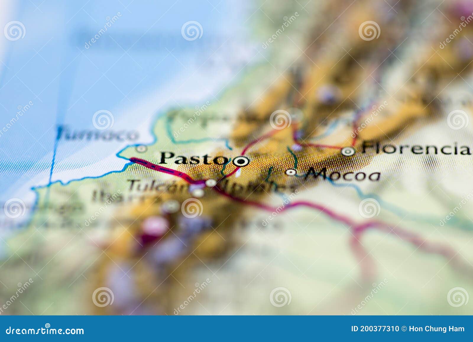 shallow depth of field focus on geographical map location of pasto city colombia south america continent on atlas