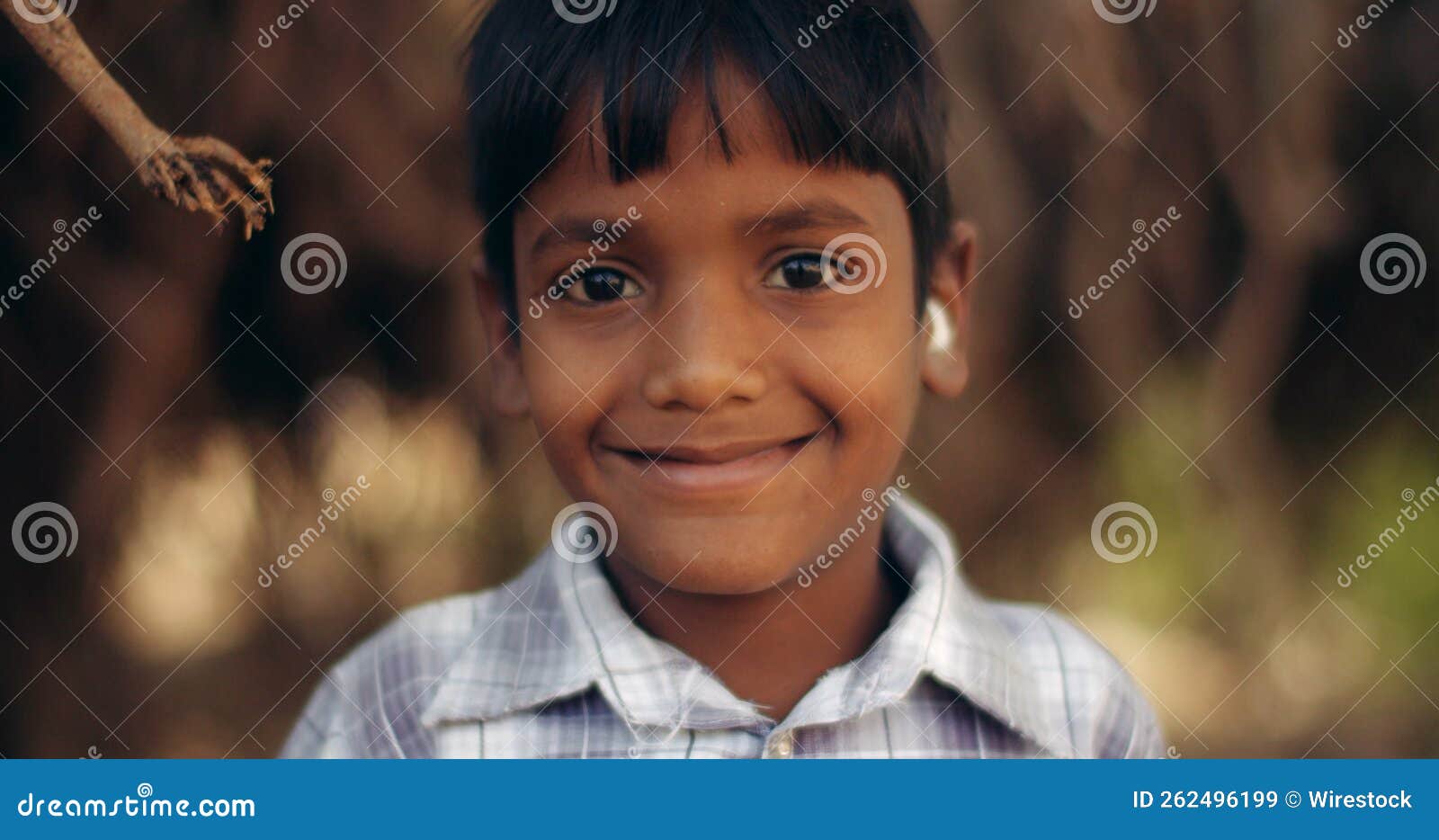 Shallow Focus of a Smiling Indian Boy Outdoors Stock Image Image of
