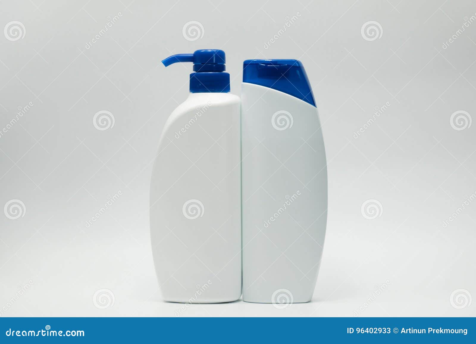 shampoo and conditioner bottles with blue cap