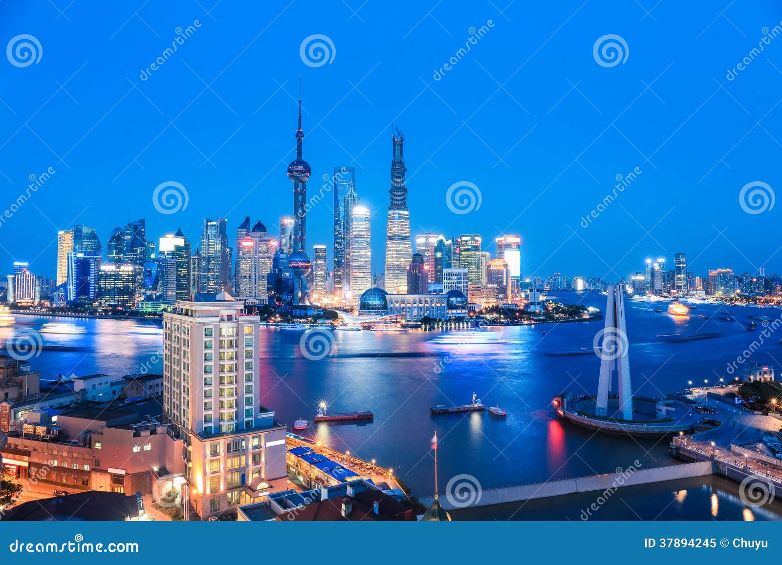 shanghai skyline and huangpu river in nightfall