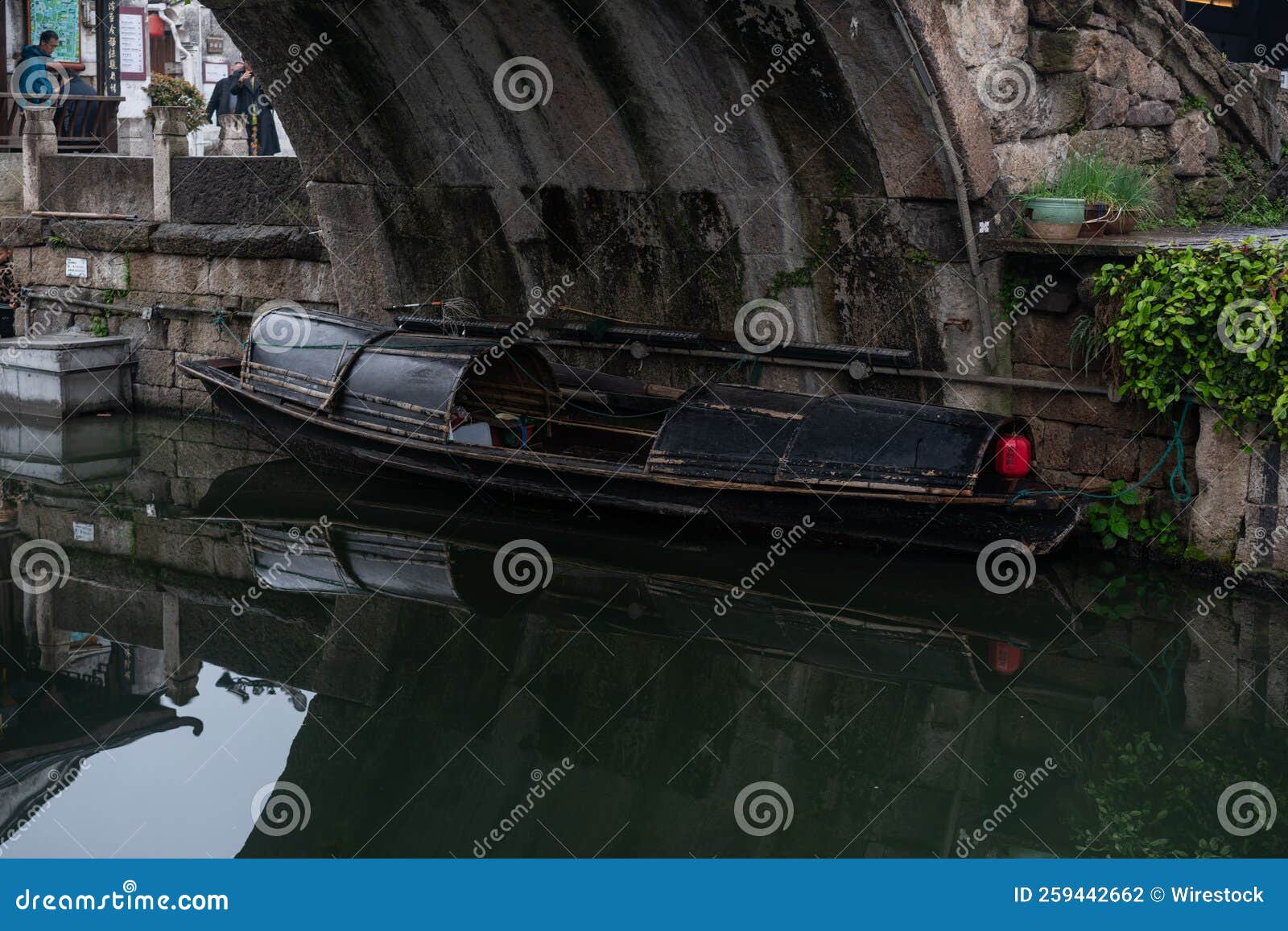 Shaoxing River and a Small Boat Under the Bridge in Chinese Style