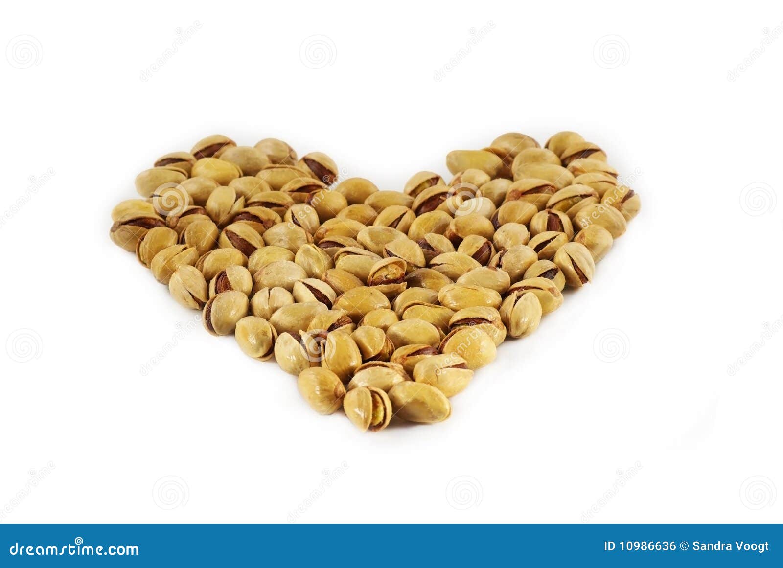 Shaped heart of pistachios stock photo. Image of food 10986636