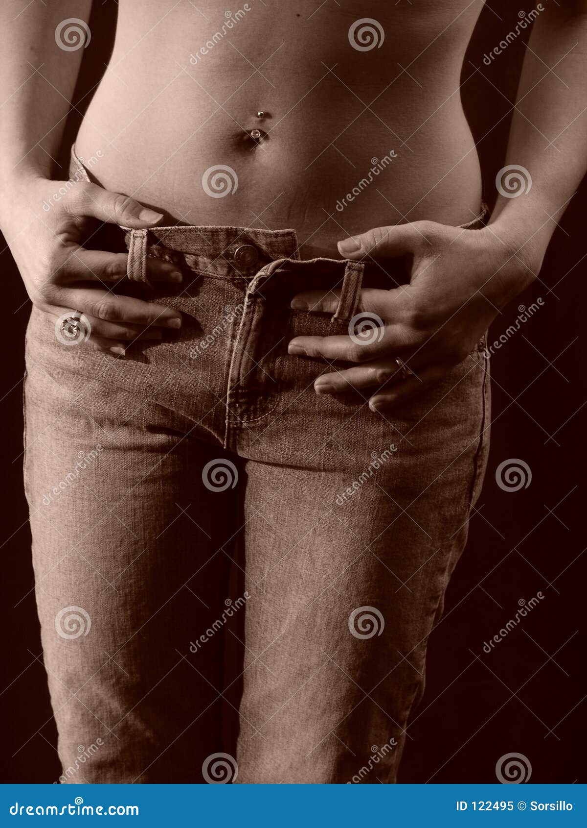 ly naked waist and abs of woman in jeans