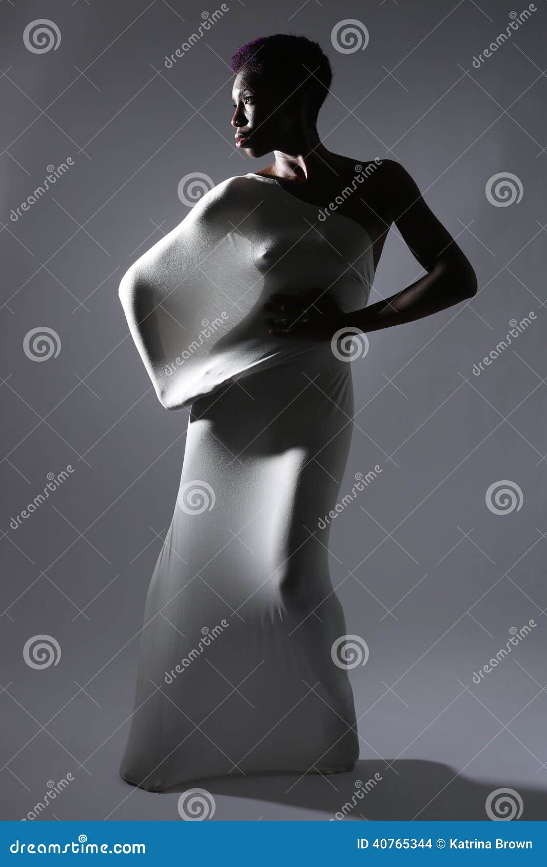 ly woman in creative light and spandex fabric