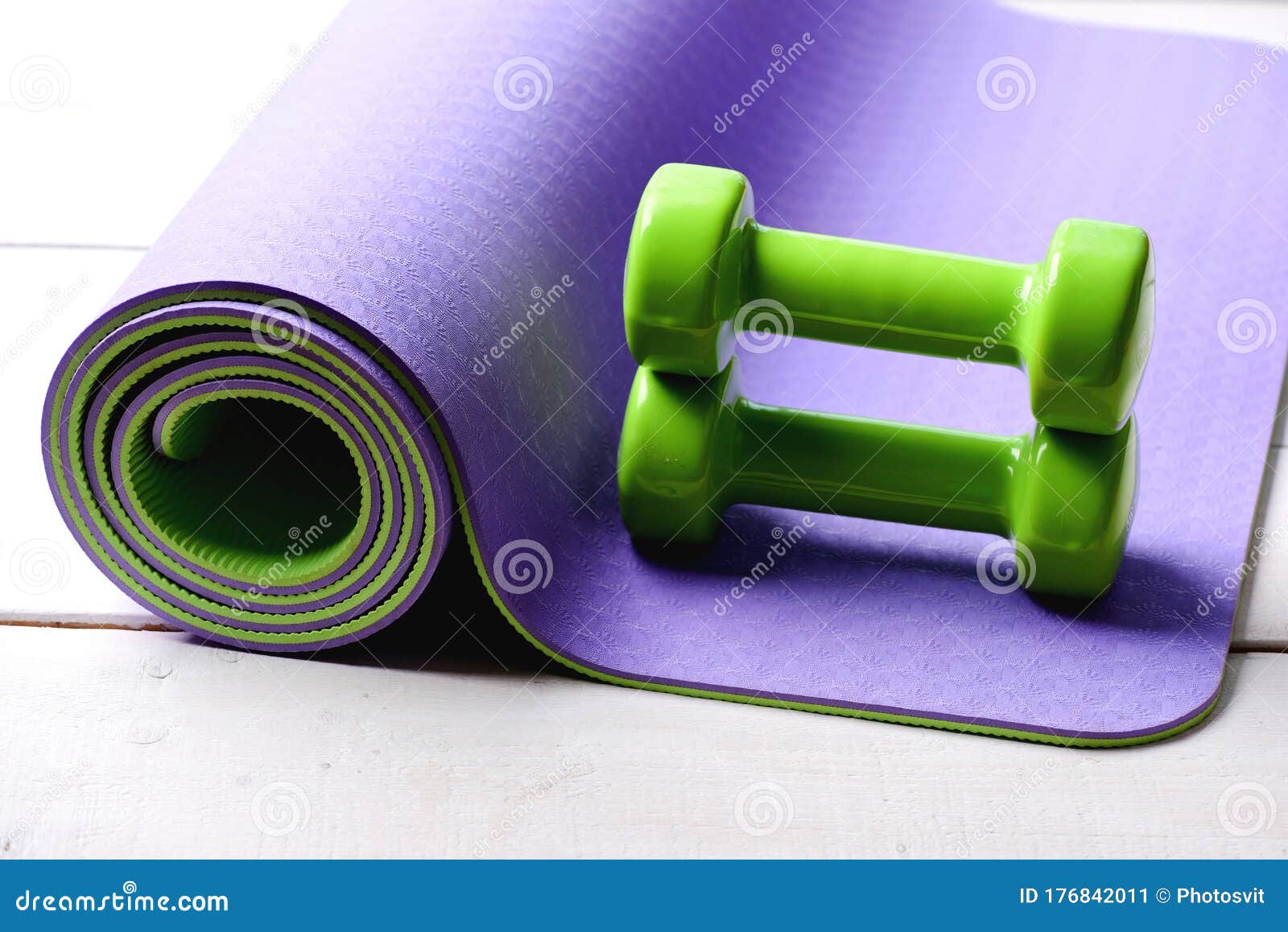 Shaping and Fitness Equipment. Barbells Lying on Purple Yoga Mat Stock ...