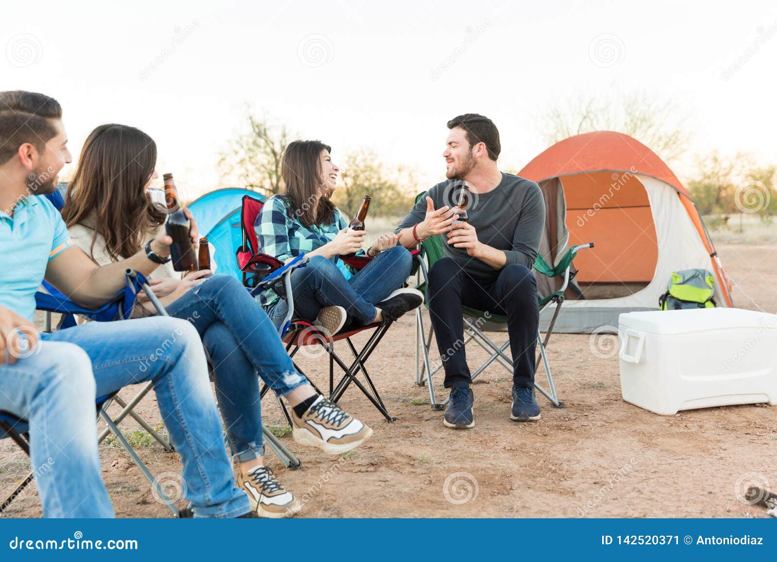 Sharing Funny Moments with Friends while Camping Stock Image - Image of ...