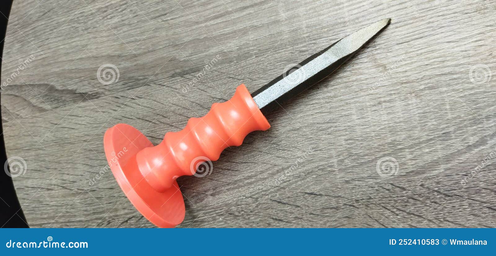 sharp-edged concrete chisel