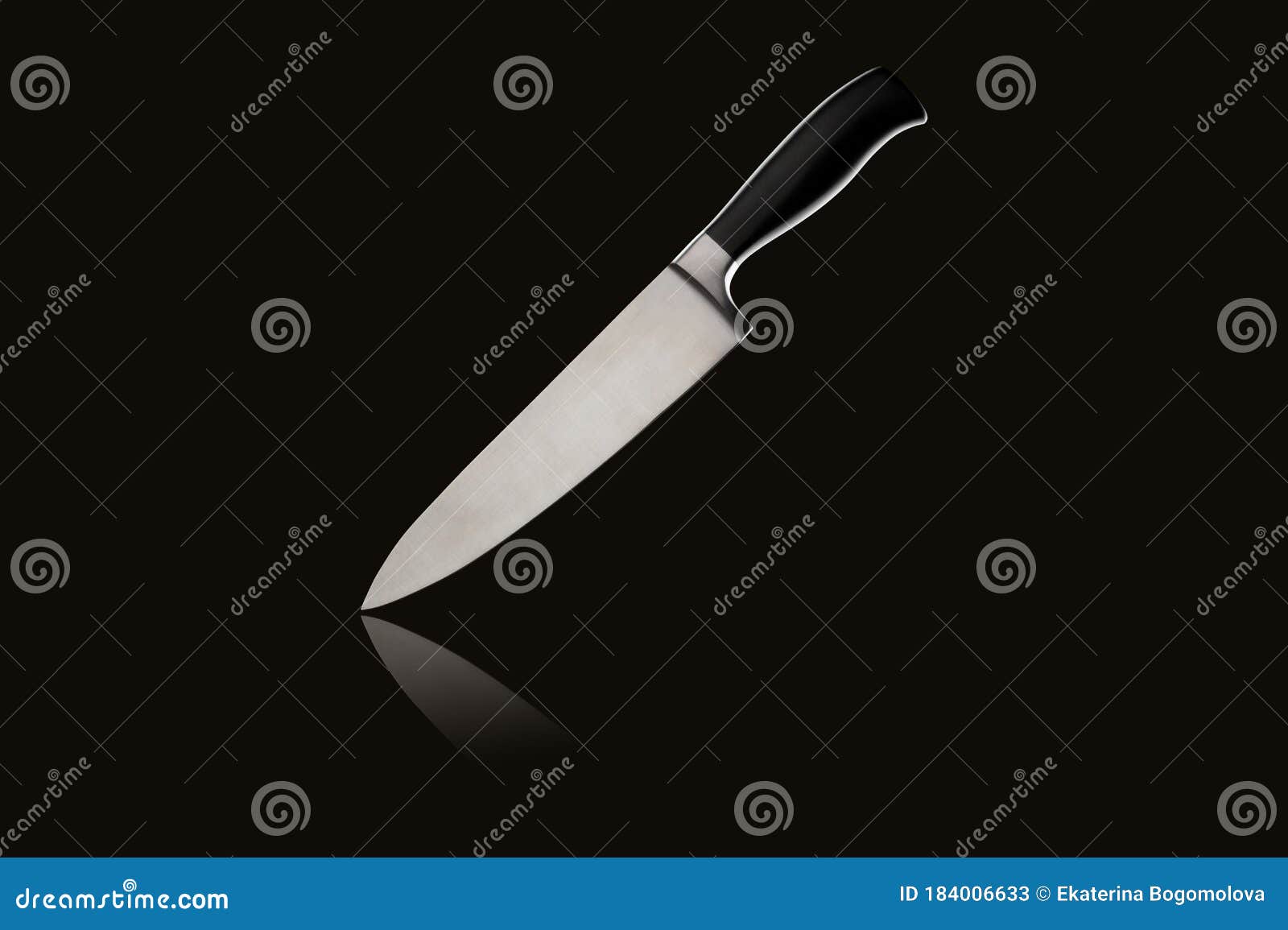 Sharp Large Kitchen Knife with Handle on Black Isolated Background