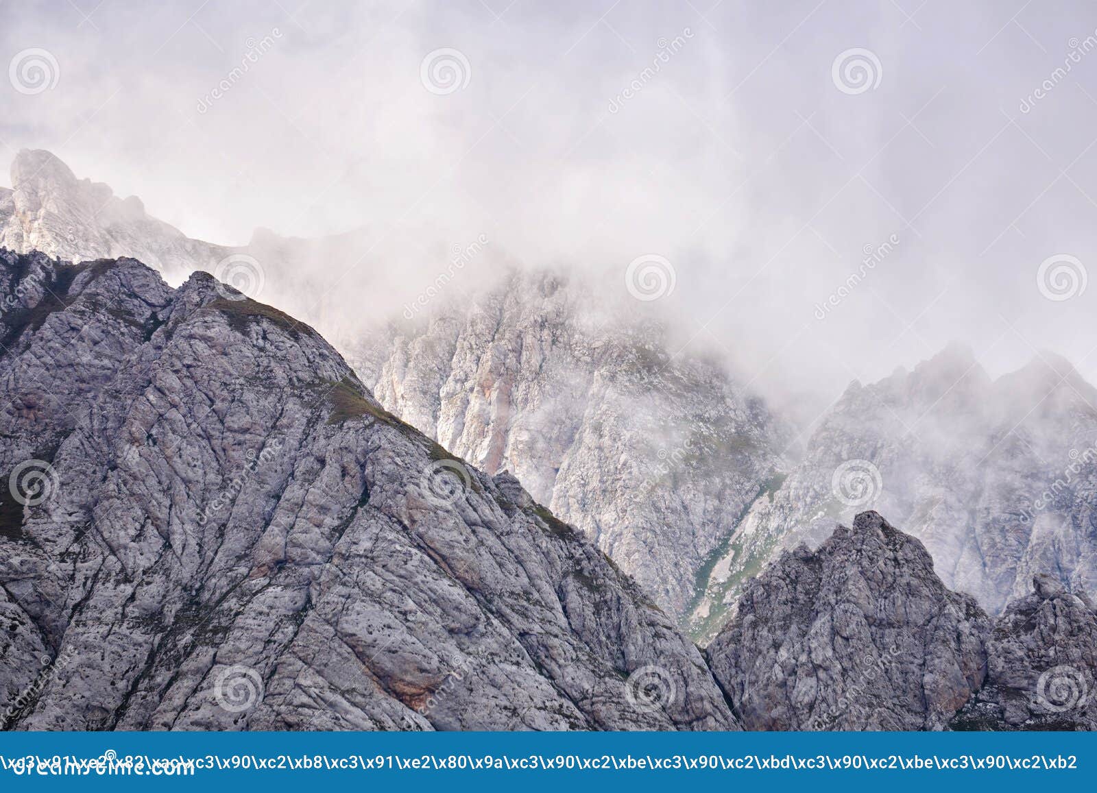 Sharp Rocky Mountain Peaks Lurk In The Clouds Stock Image Image Of