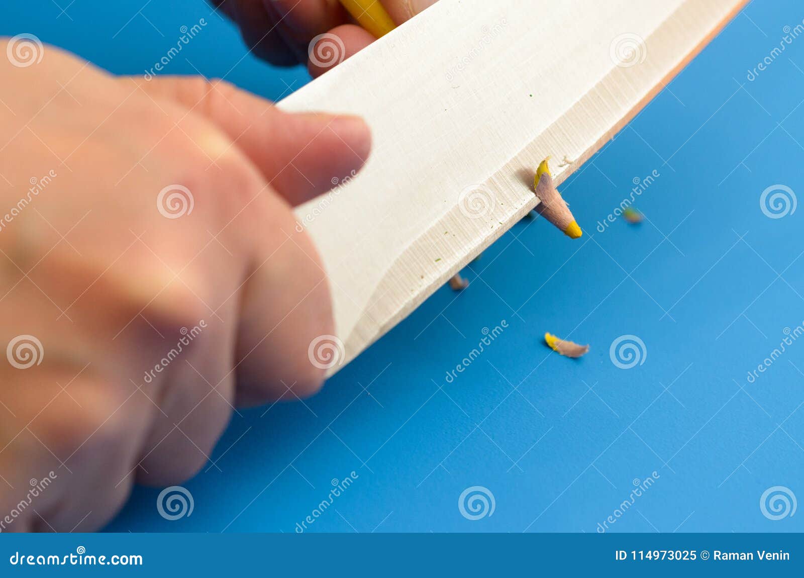 Sharpen the Colored Pencils with a Knife. Stock Image Image of black
