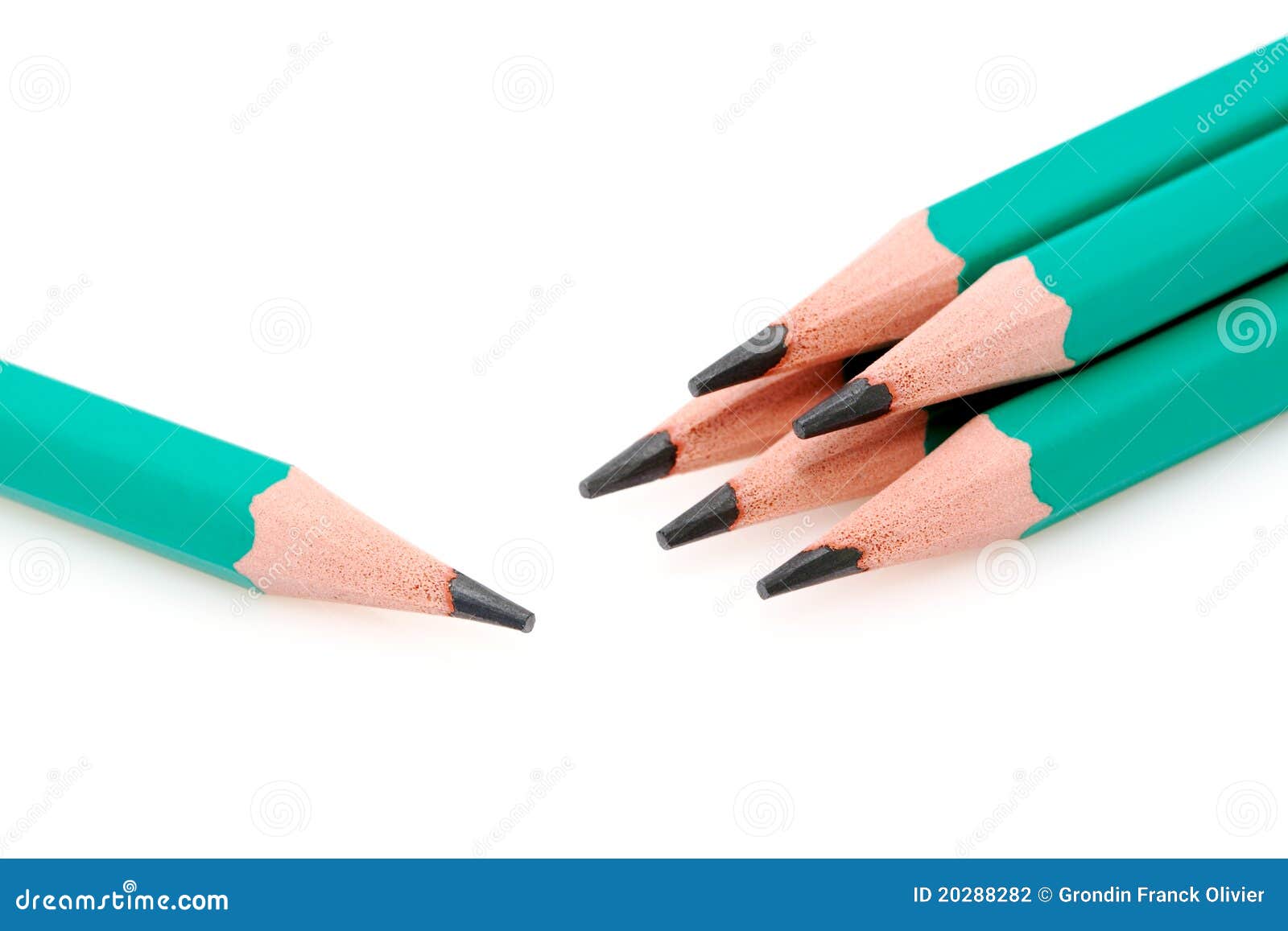 Five Sharpened Pencil Tips Pointing Down On White Background Royalty