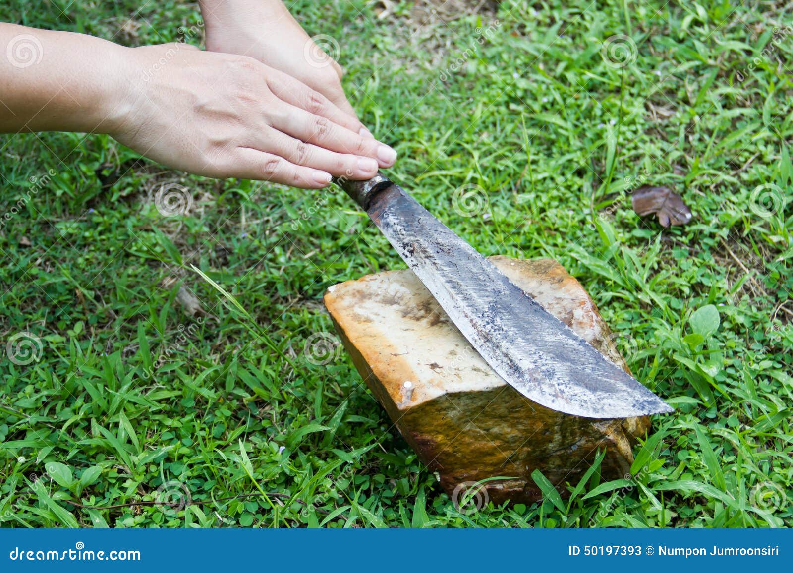 Sharpening a knife stock image. Image of metal, whetstone 50197393