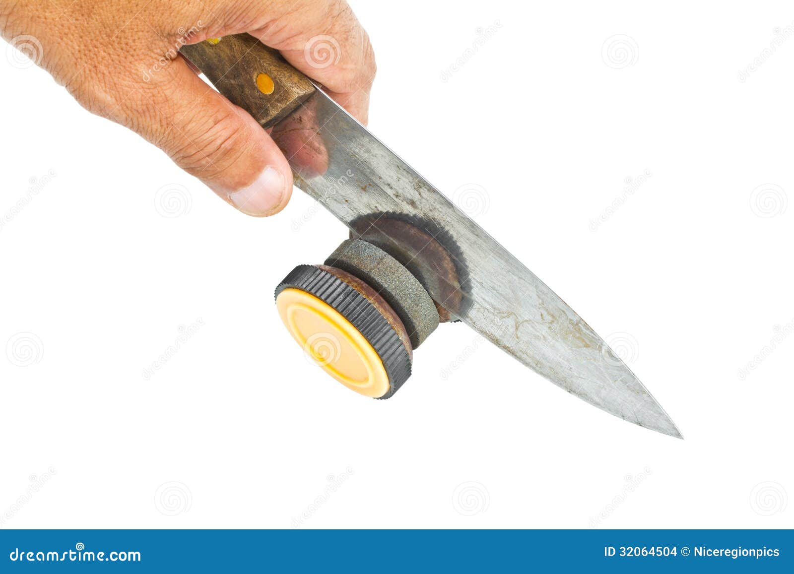 Sharpening a Knife with a Knife Grinder. Stock Photo Image of