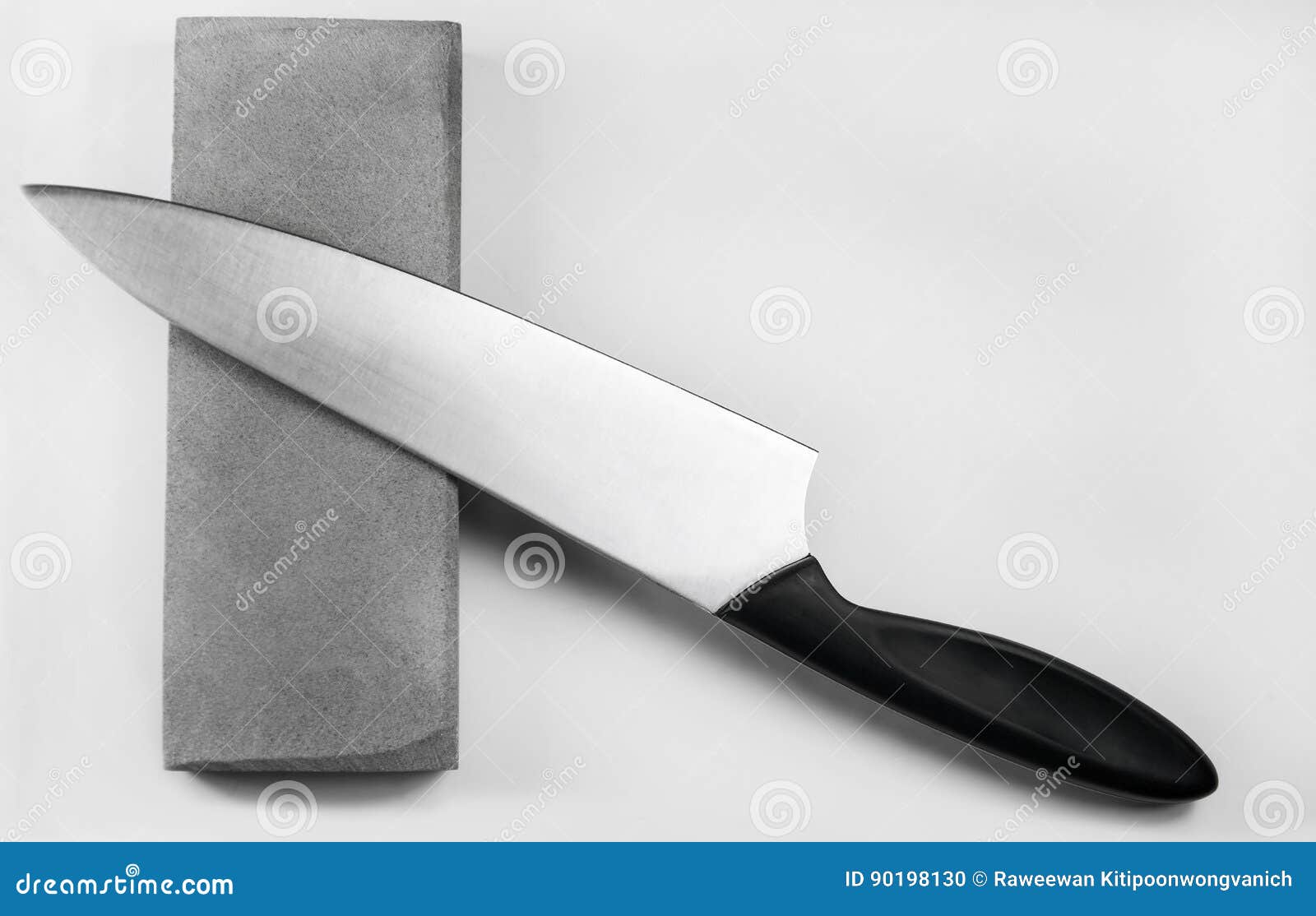 Sharpening a Knife on a Whetstone Stock Photo Image of hone, steel