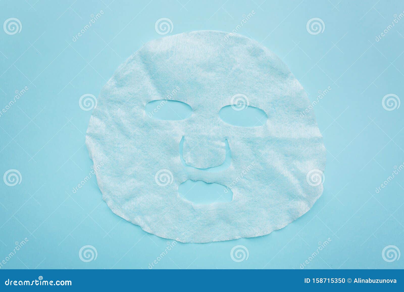 Download Sheet Facial Mask On Pastel Blue Paper Background. Skin ...
