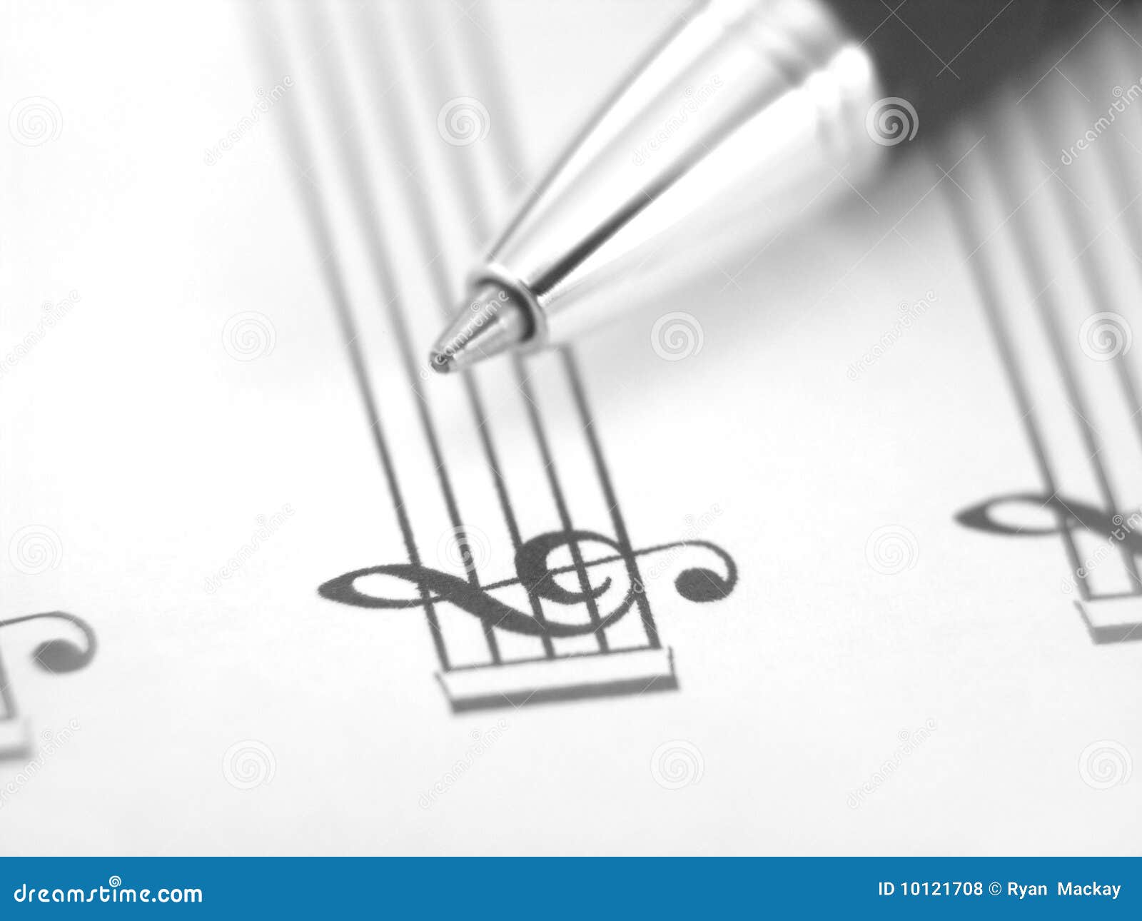 Sheet music with pen. Ball point pen on blank sheet music