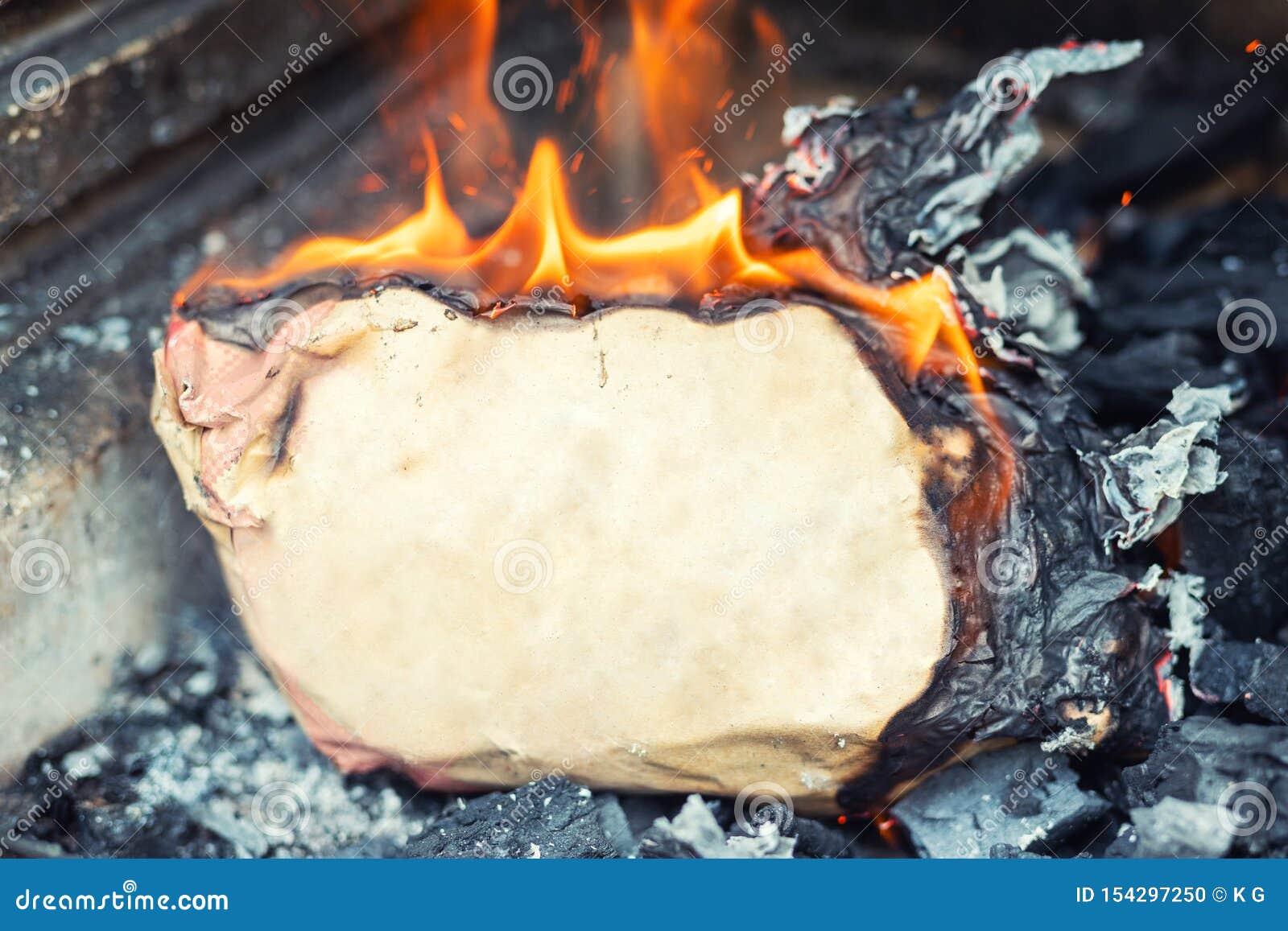 Image of Burning Roll of Parchment Conceptual Background