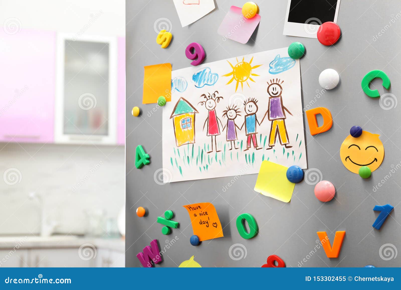 Sheets of Paper, Child`s Drawing and on Refrigerator Door in