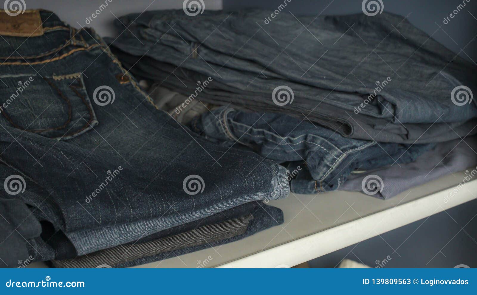 Shelf with Jeans in the Closet Stock Image Image of fashionable, hook