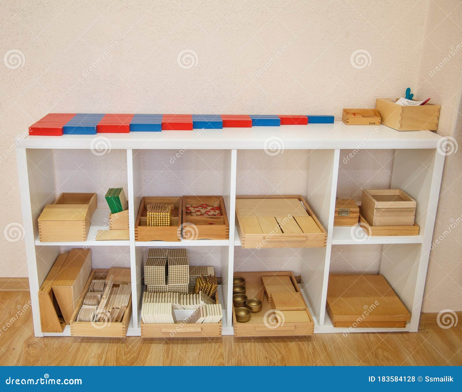 Shelf in Montessori school stock photo. Image of education 183584128