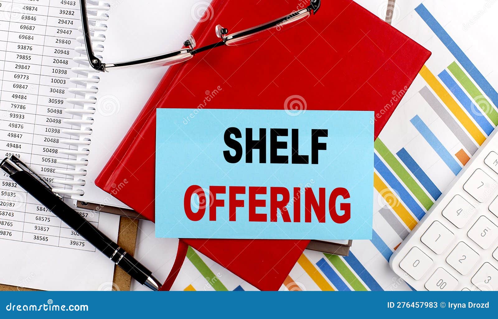 FIXED Text Written on a Sticky on Colorful Notebooks Stock