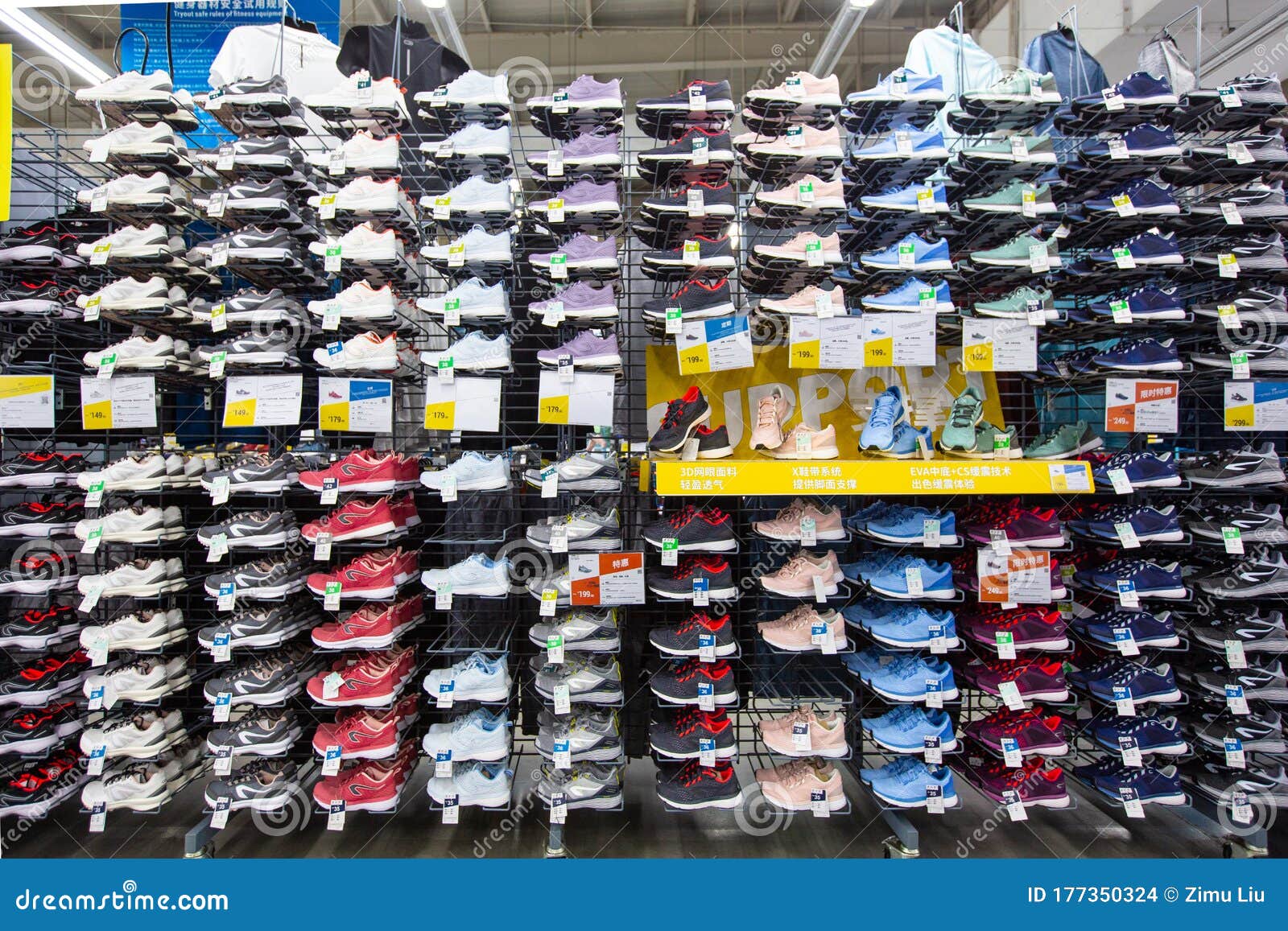 A Shelf of Running Shoes in a Supermarket Editorial Stock Image - Image ...