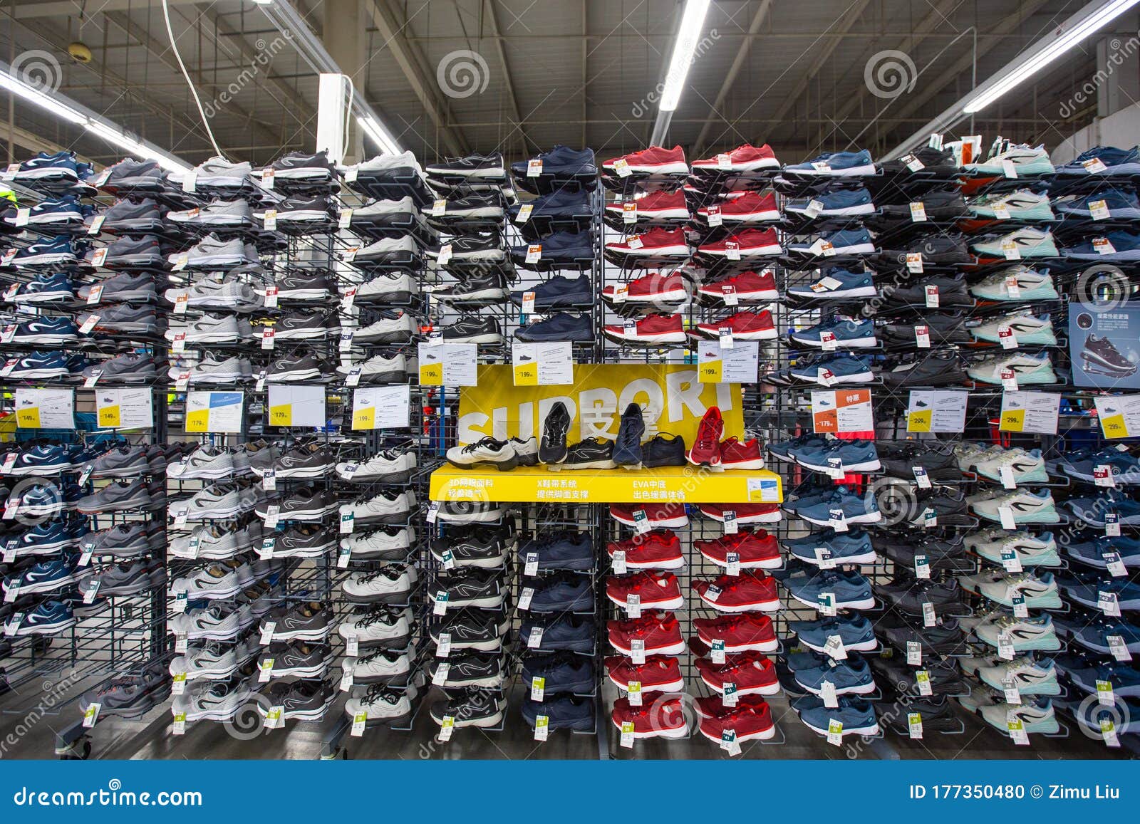 A Shelf of Running Shoes in a Supermarket Editorial Image - Image of ...