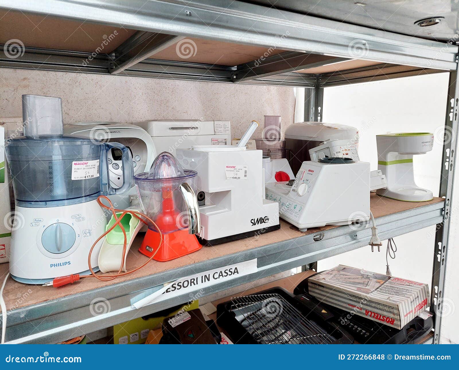 Shelf with Secondhand Appliances Inside a Store Editorial Stock Photo