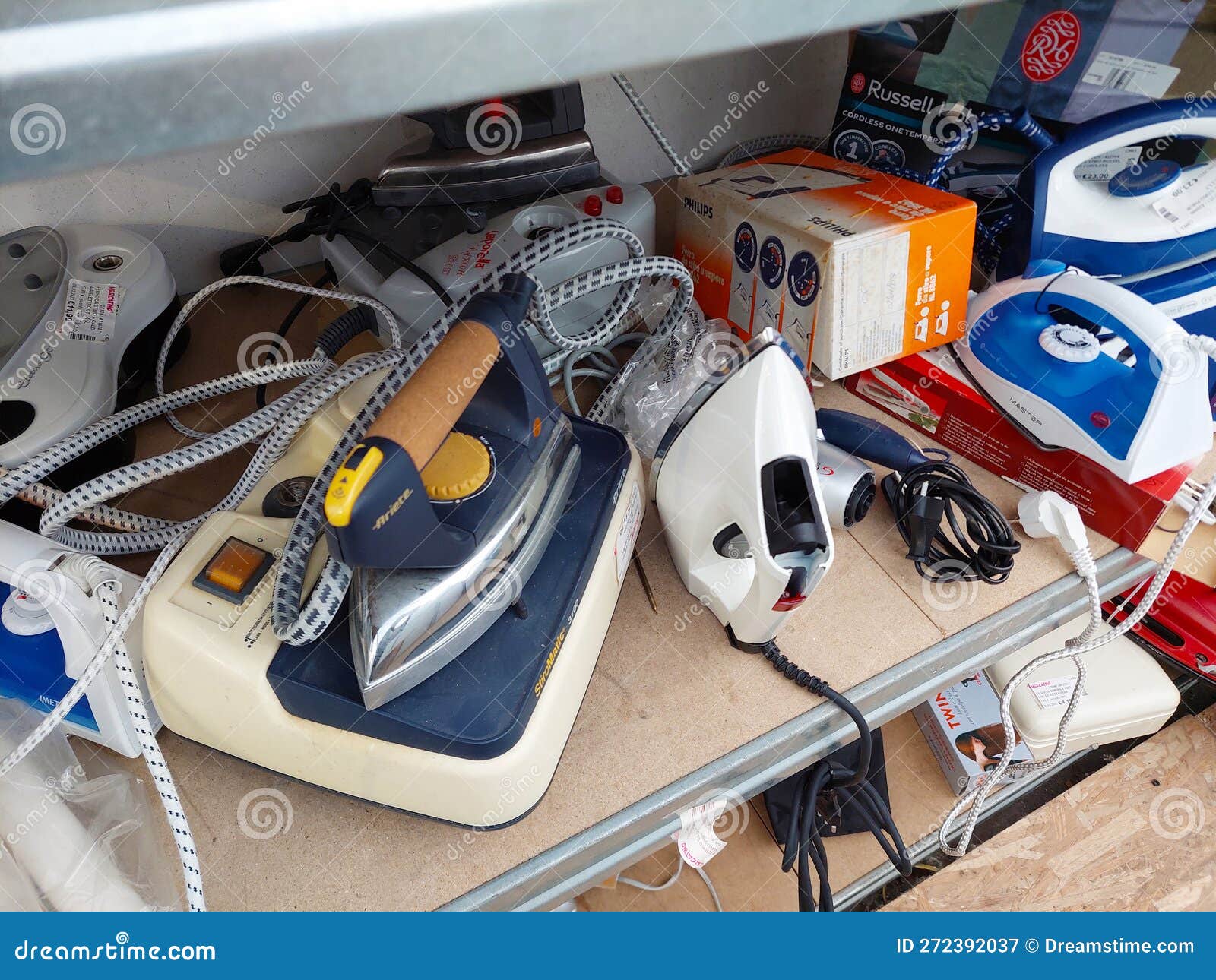 Shelf with Secondhand Appliances Inside a Store Editorial Photography