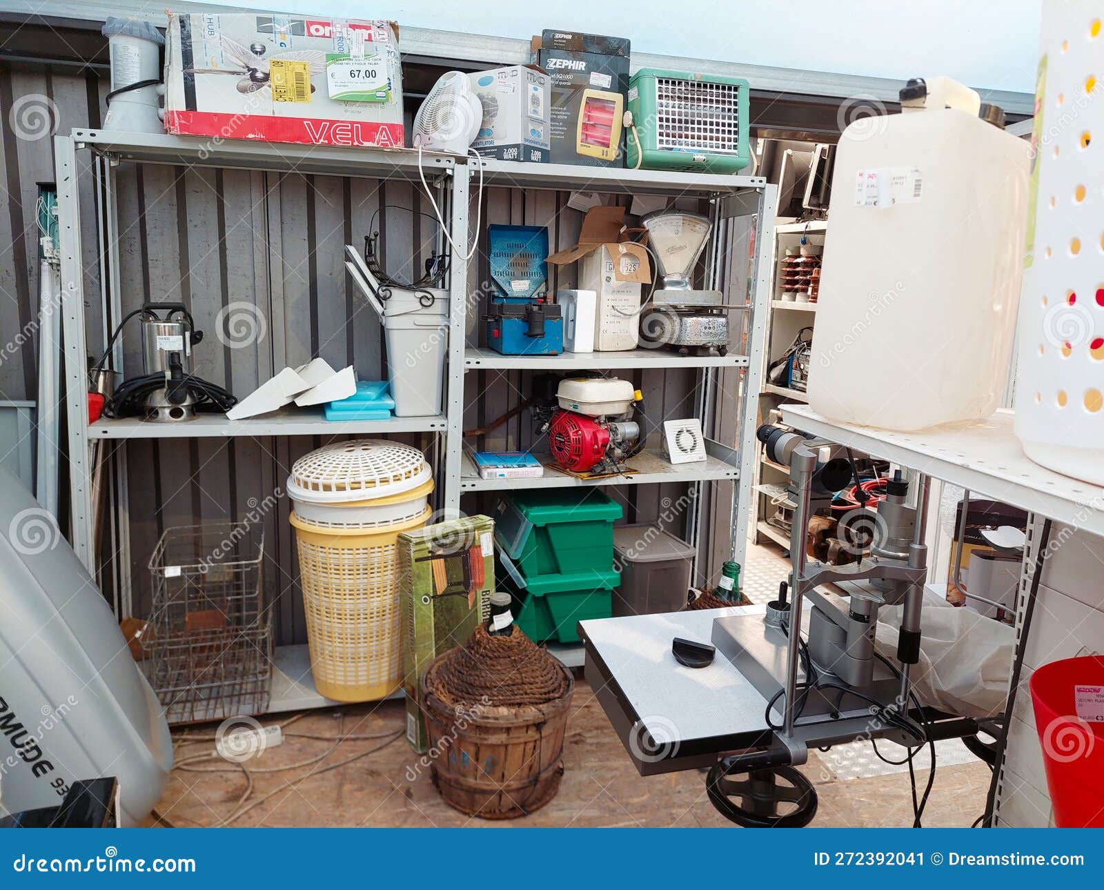 Shelf with Secondhand Appliances Inside a Store Editorial Photo