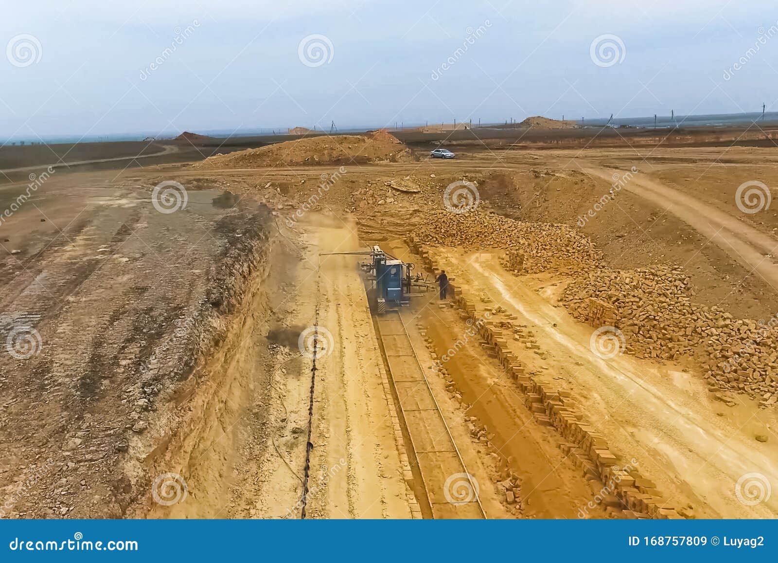 Shell Quarry Quarry. Cutting Seashell into Blocks Right Away in Stock
