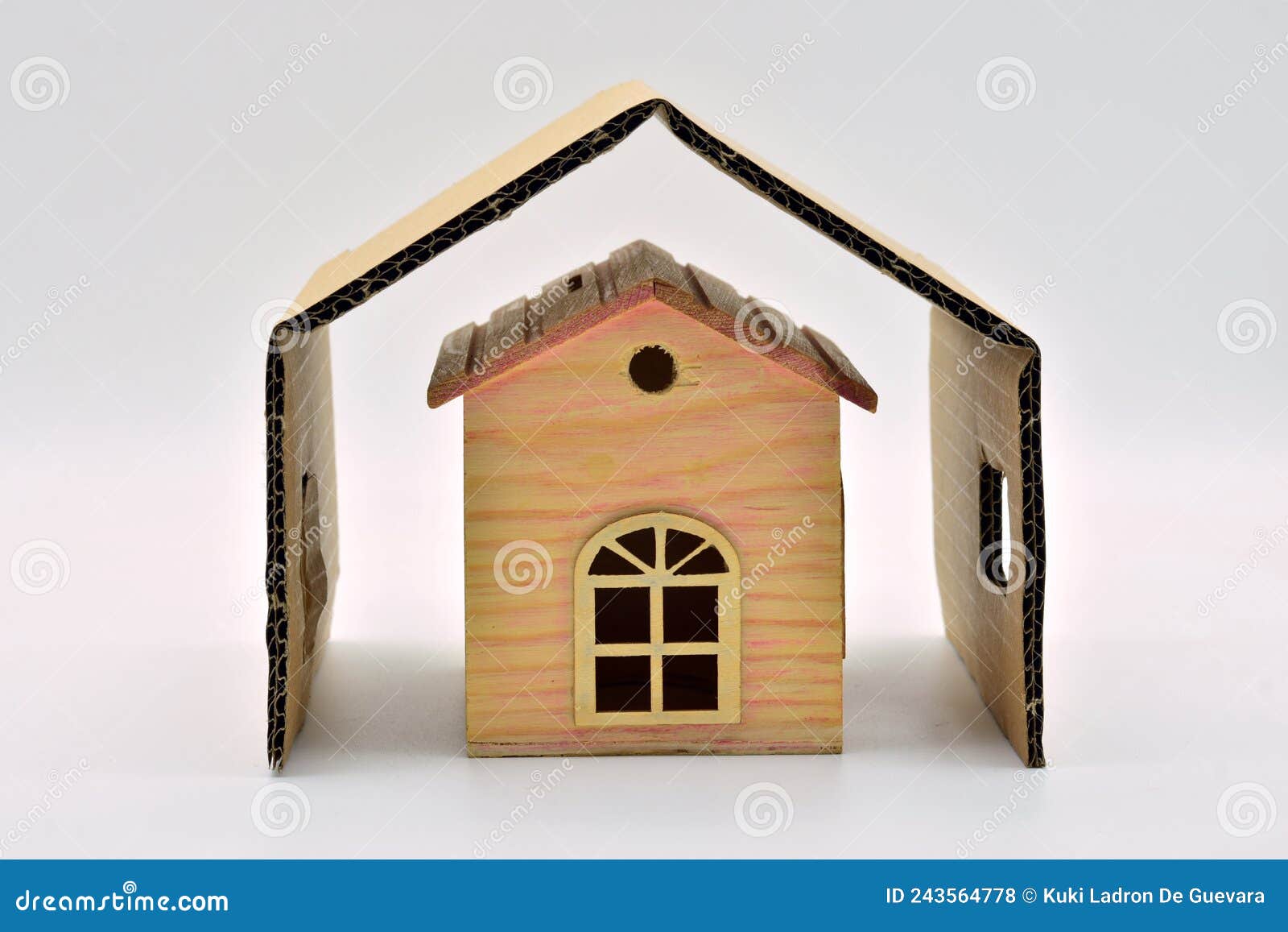 sheltered miniature wooden house