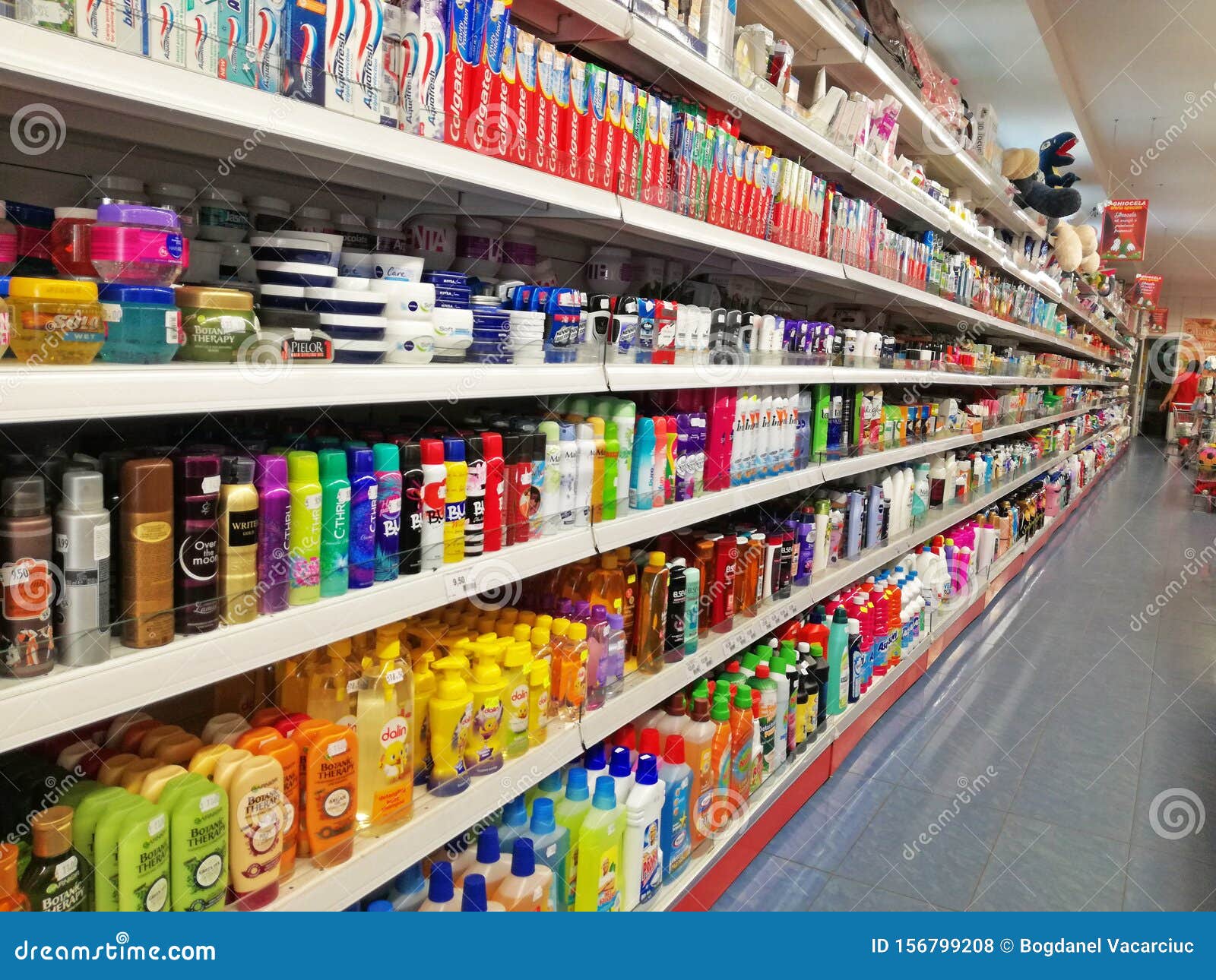 Shelves with Different Cosmetics, Cleaning and Other Products, in the Store Editorial Stock