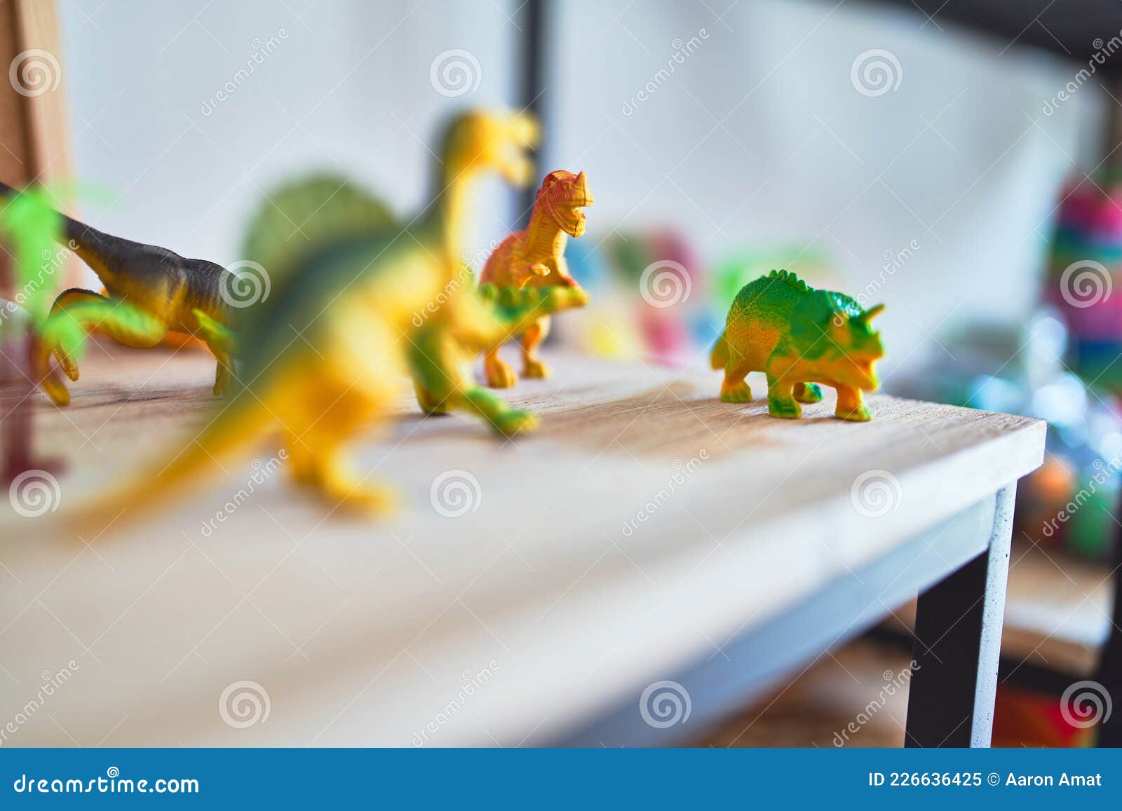 shelving with plastico dinosaurs toys at kindergarten
