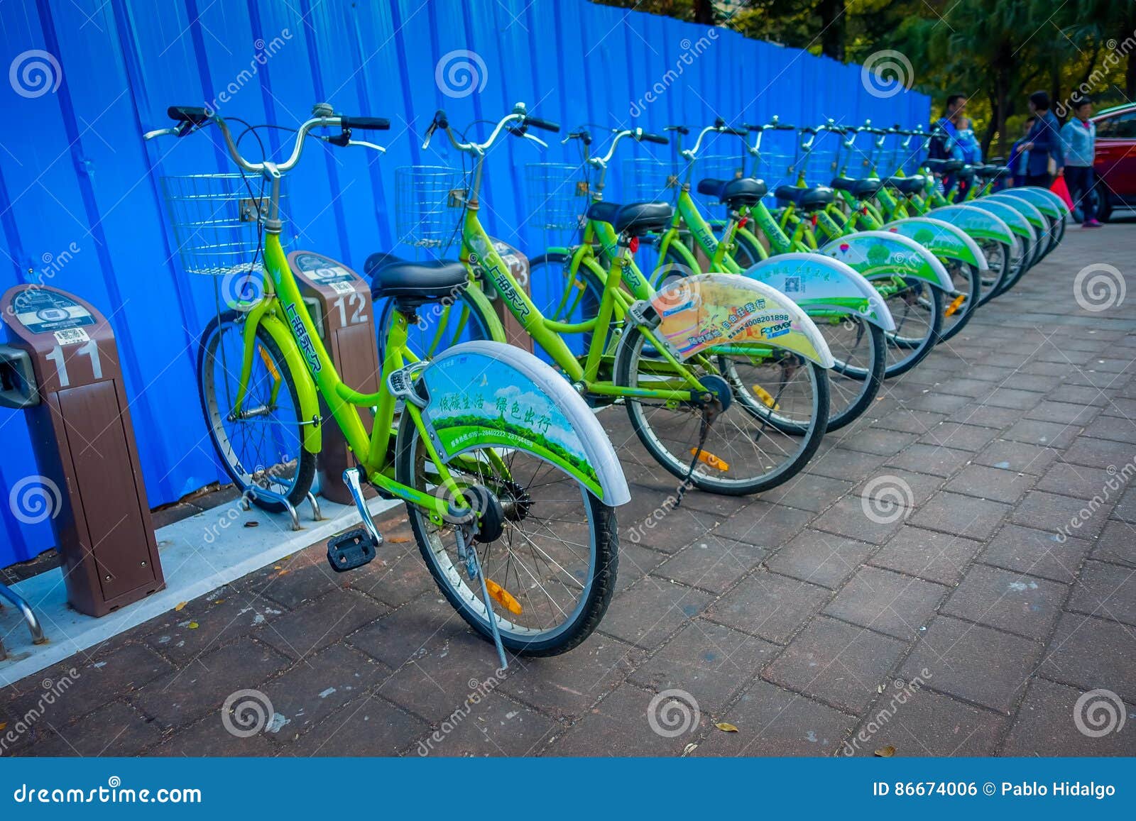 SHENZEN, CHINA - 29 JANUARY, 2017: City Bike Parking, Row of Green ...