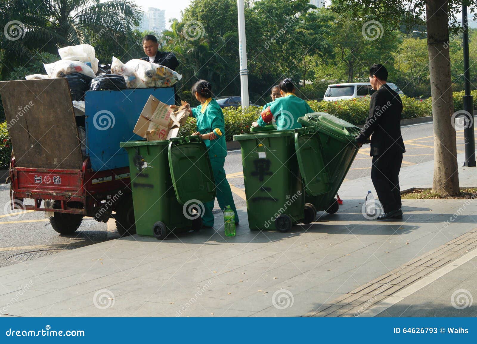 Shenzhen, China Sanitation Workers in Garbage Removal Editorial Stock
