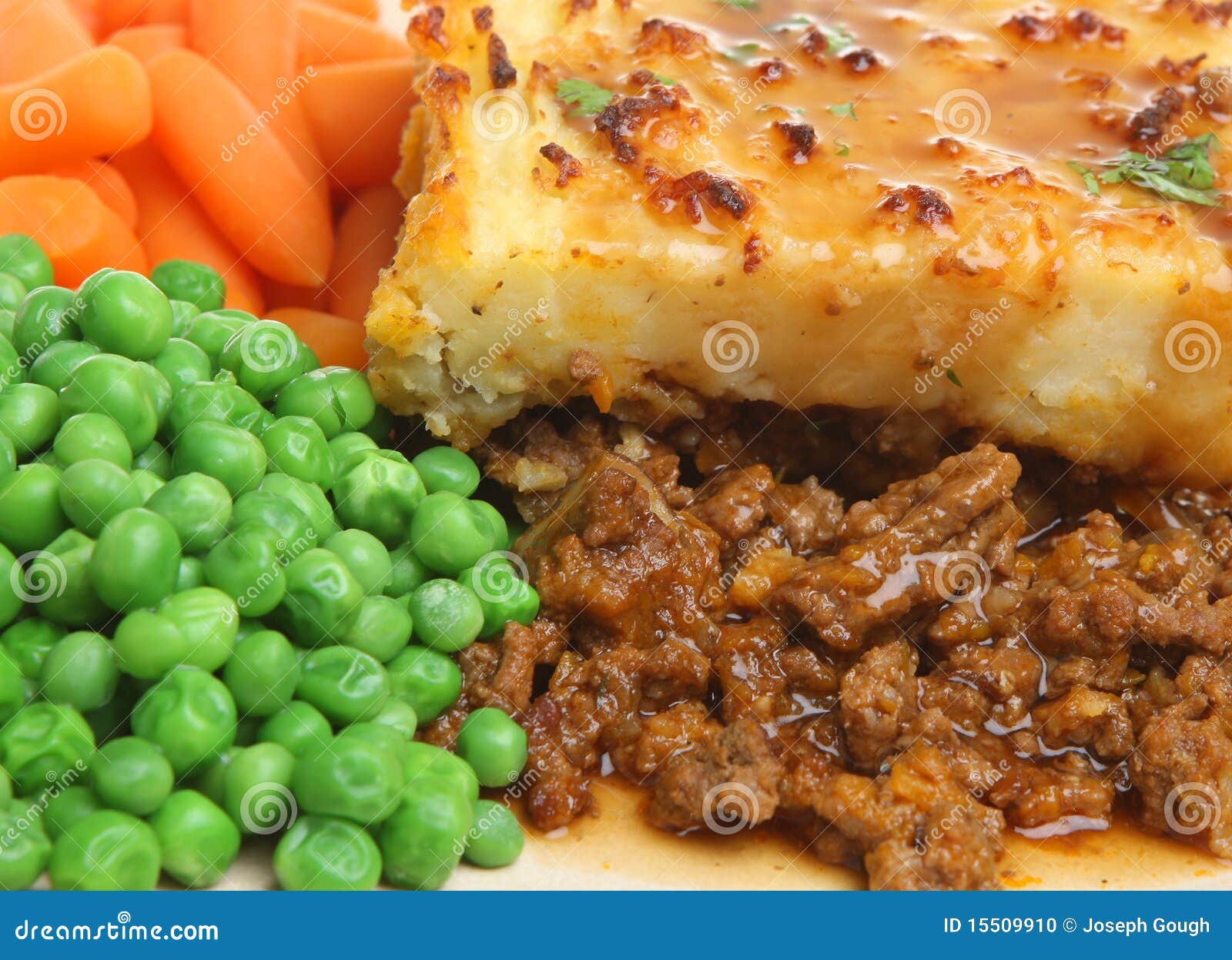 Shepherds Pie With Peas Carrots Stock Photo Image Of Closeup