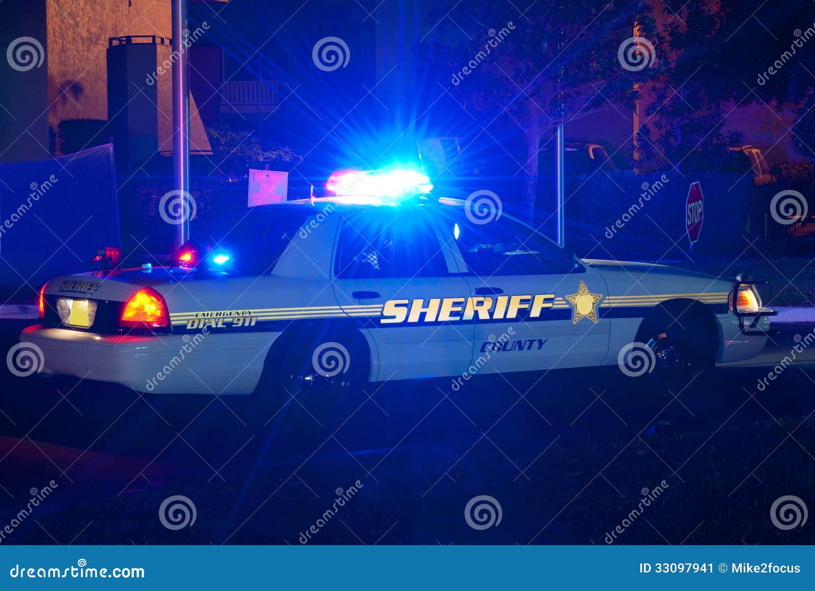 sheriff car at night with lights on