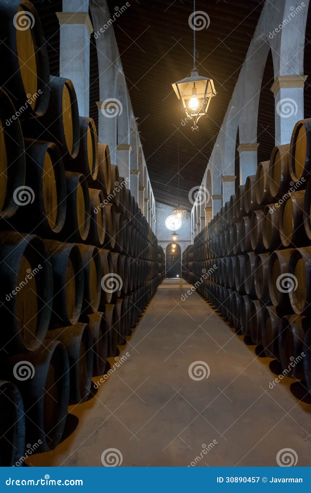 sherry barrels in jerez bodega, spain